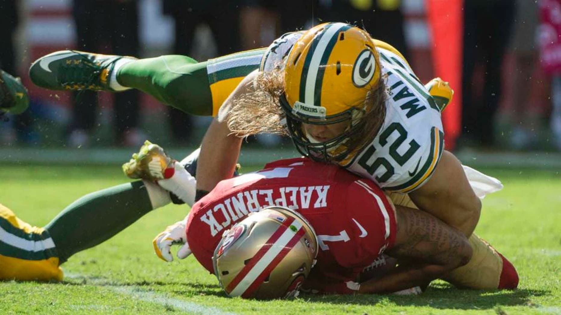 Green Bay Packers inside linebacker Clay Matthews sacks San Francisco 49ers quarterback Colin Kaepernick during the third quarter at Levi's Stadium in Santa Clara, Calif., on Sunday, Oct. 4, 2015.