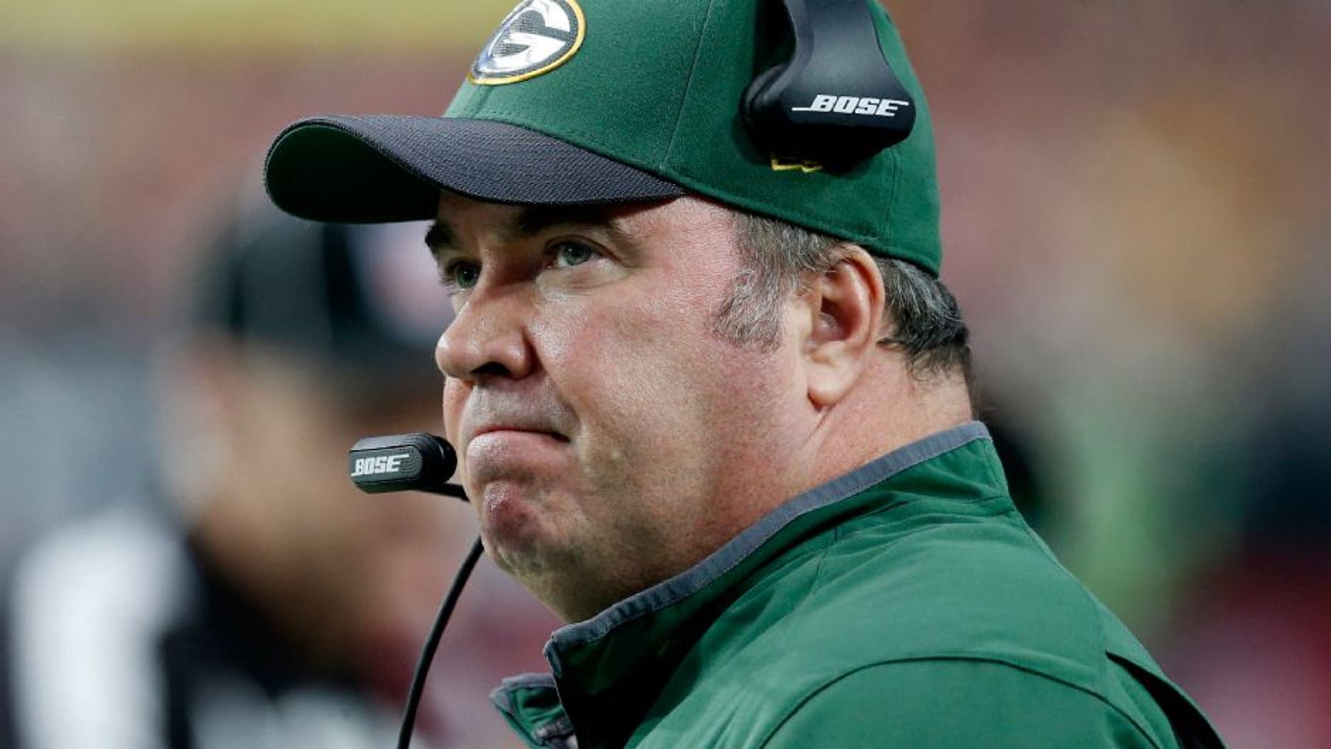 In this Dec. 27, 2015, file photo, Green Bay Packers head coach Mike McCarthy watches his team against the Arizona Cardinals in Glendale, Ariz.