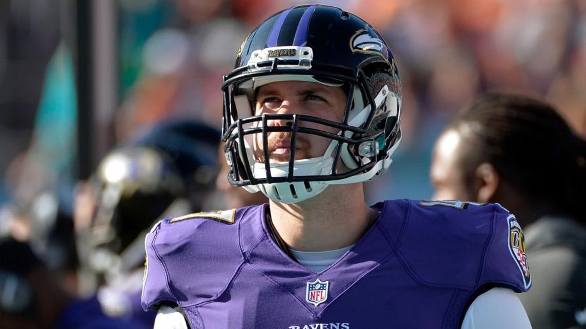 Dec 7, 2014; Miami Gardens, FL, USA; Baltimore Ravens long snapper Kevin McDermott looks on during the second half against the Miami Dolphins at Sun Life Stadium. Ravens won 28-13.