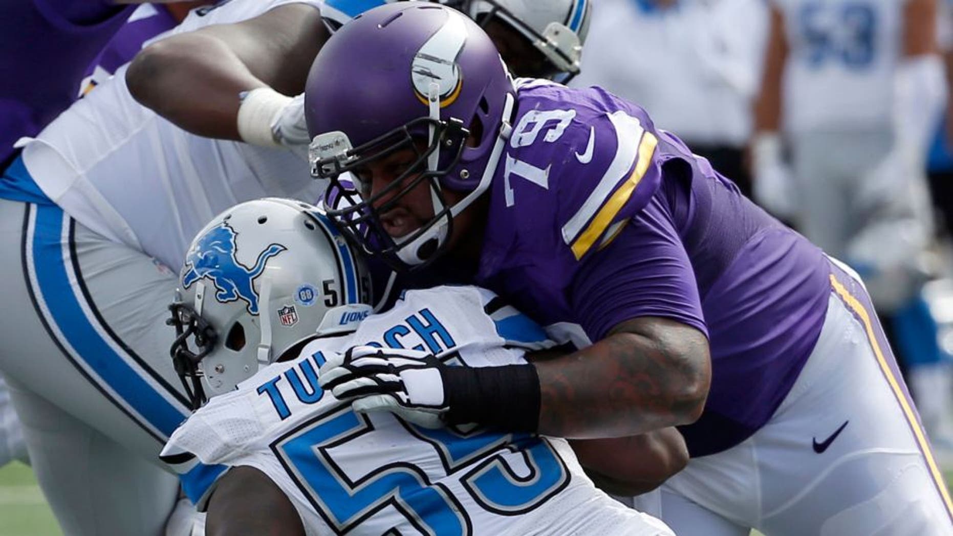 In this Sept. 20, 2015, file photo, Minnesota Vikings guard Mike Harris keeps Detroit Lions linebacker Stephen Tulloch (55) away from the play during the first half of an NFL football game in Minneapolis. Harris had made sure the Vikings haven't had to worry about the right guard, despite his inexperience at the position. (AP Photo/Ann Heisenfelt)