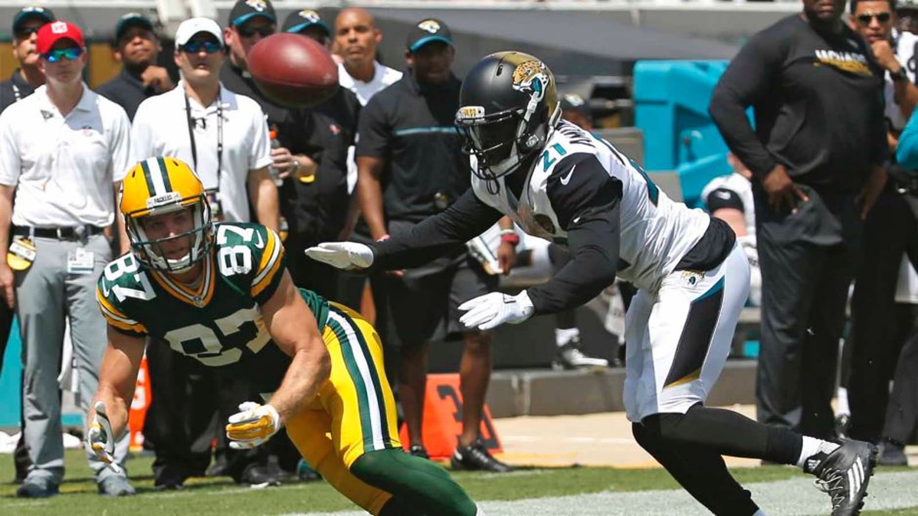 Green Bay Packers wide receiver Jordy Nelson makes a reception in front of Jacksonville Jaguars defensive back Prince Amukamara during the first half in Jacksonville, Fla., Sunday, Sept. 11, 2016.