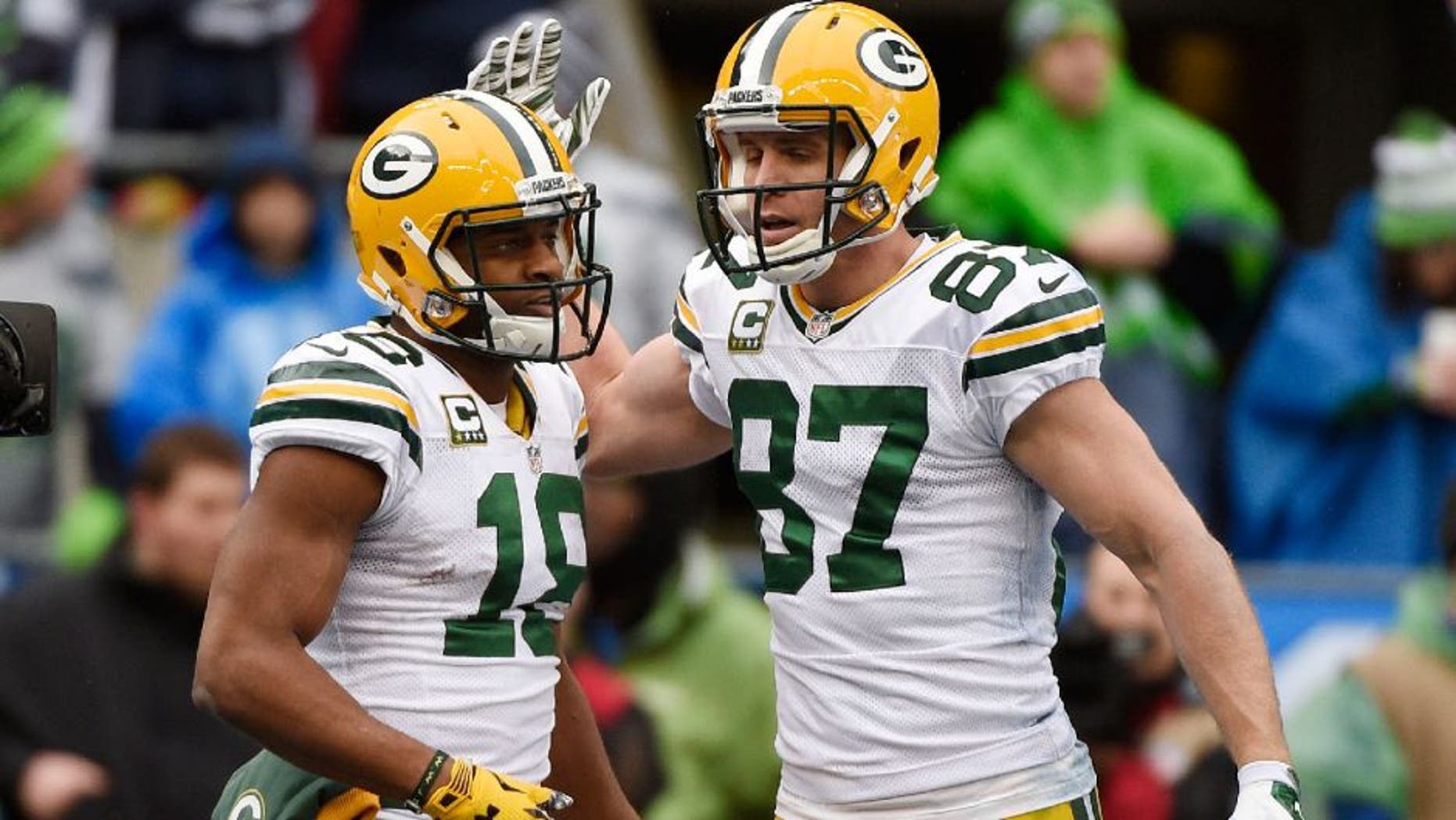 January 18, 2015; Seattle, WA, USA; Green Bay Packers wide receiver Randall Cobb (18) is congratulated by wide receiver Jordy Nelson (87) after scoring a touchdown against the Seattle Seahawks during the first half in the NFC Championship game at CenturyLink Field. Mandatory Credit: Kyle Terada-USA TODAY Sports ,January 18, 2015; Seattle, WA, USA; Green Bay Packers wide receiver Randall Cobb (18) is congratulated by wide receiver Jordy Nelson (87) after scoring a touchdown against the Seattle Seahawks during the first half in the NFC Championship game at CenturyLink Field. Mandatory Credit: Kyle Terada-USA TODAY Sports
