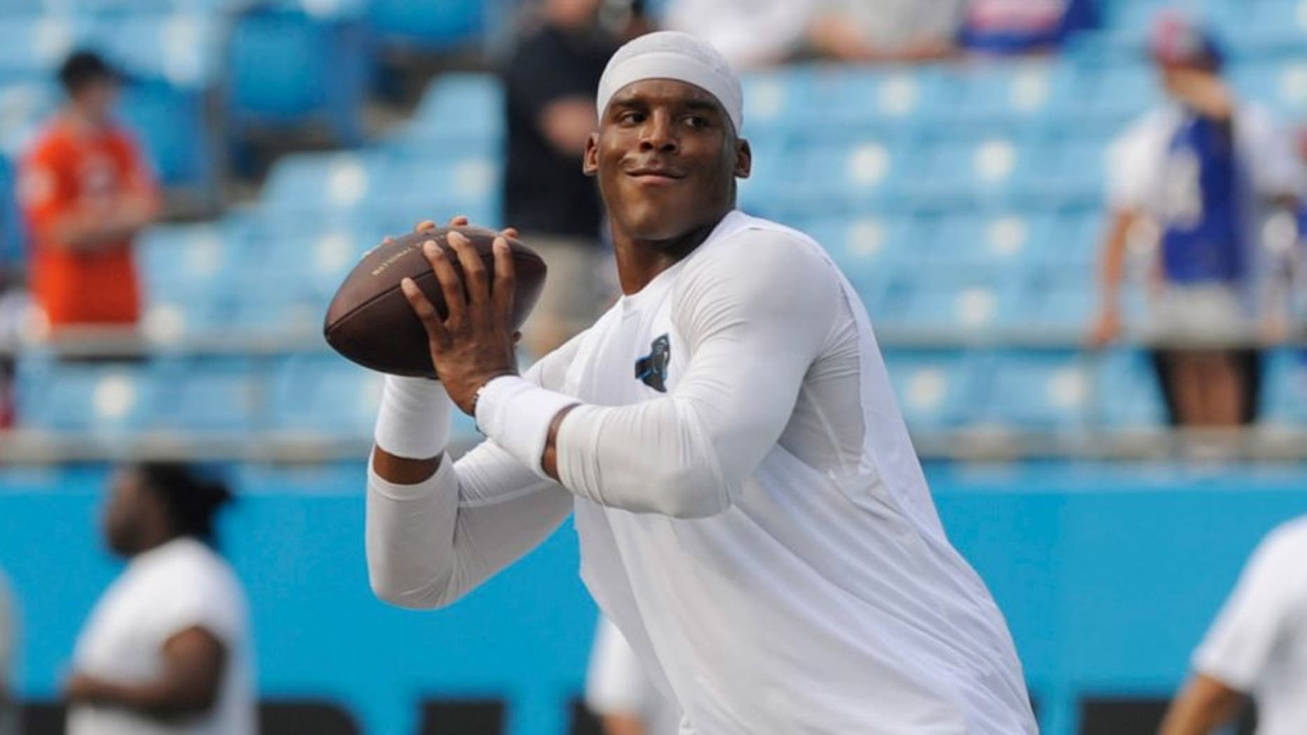 Aug 8, 2014; Charlotte, NC, USA; Carolina Panthers quarterback Cam Newton (1) warms up before the game against the Buffalo Bills at Bank of America Stadium. Mandatory Credit: Sam Sharpe-USA TODAY Sports