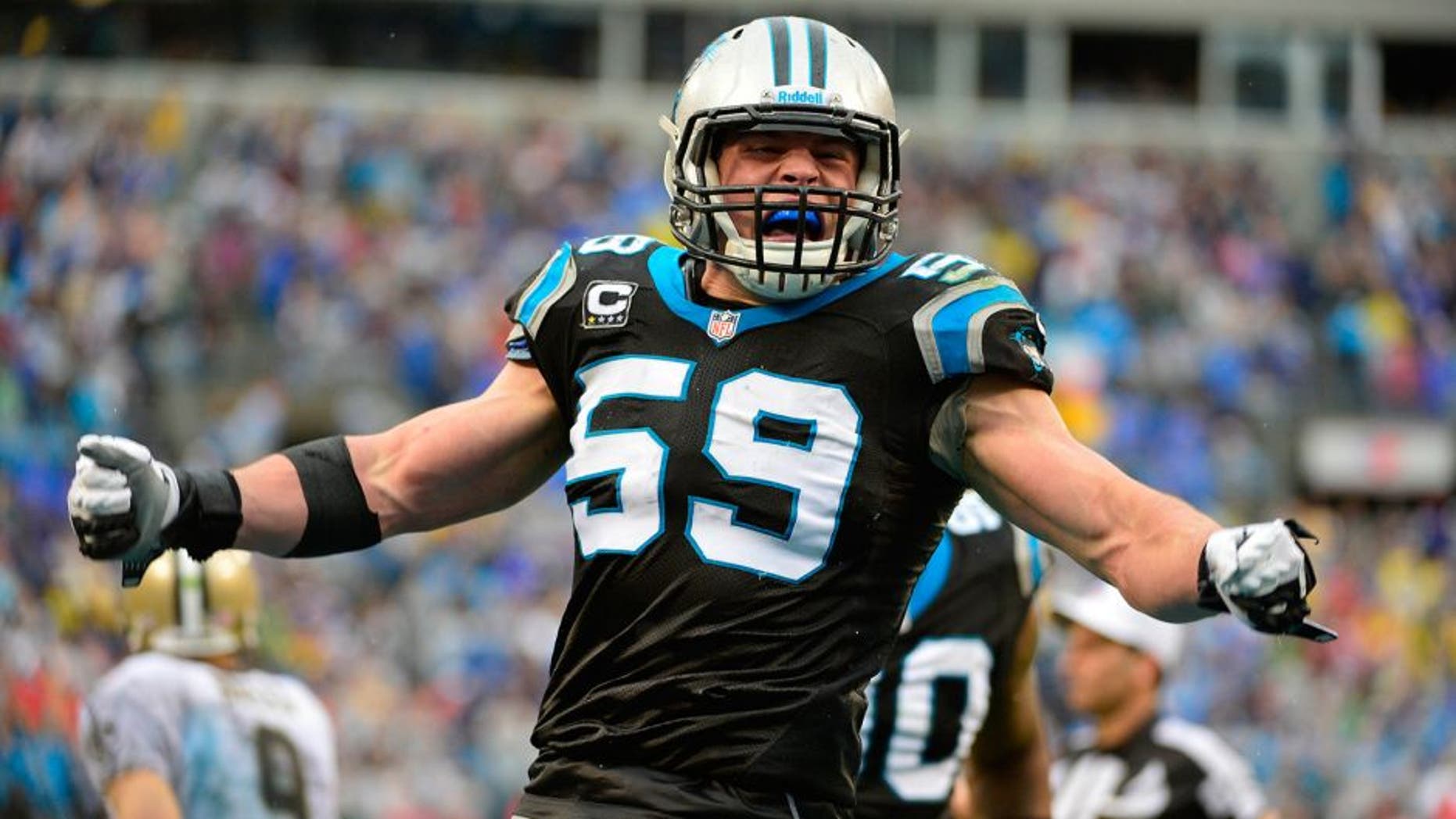 Dec 22, 2013; Charlotte, NC, USA; Carolina Panthers middle linebacker Luke Kuechly (59) reacts in the fourth quarter. The Panthers defeated the Saint 17-13 at Bank of America Stadium. Mandatory Credit: Bob Donnan-USA TODAY Sports
