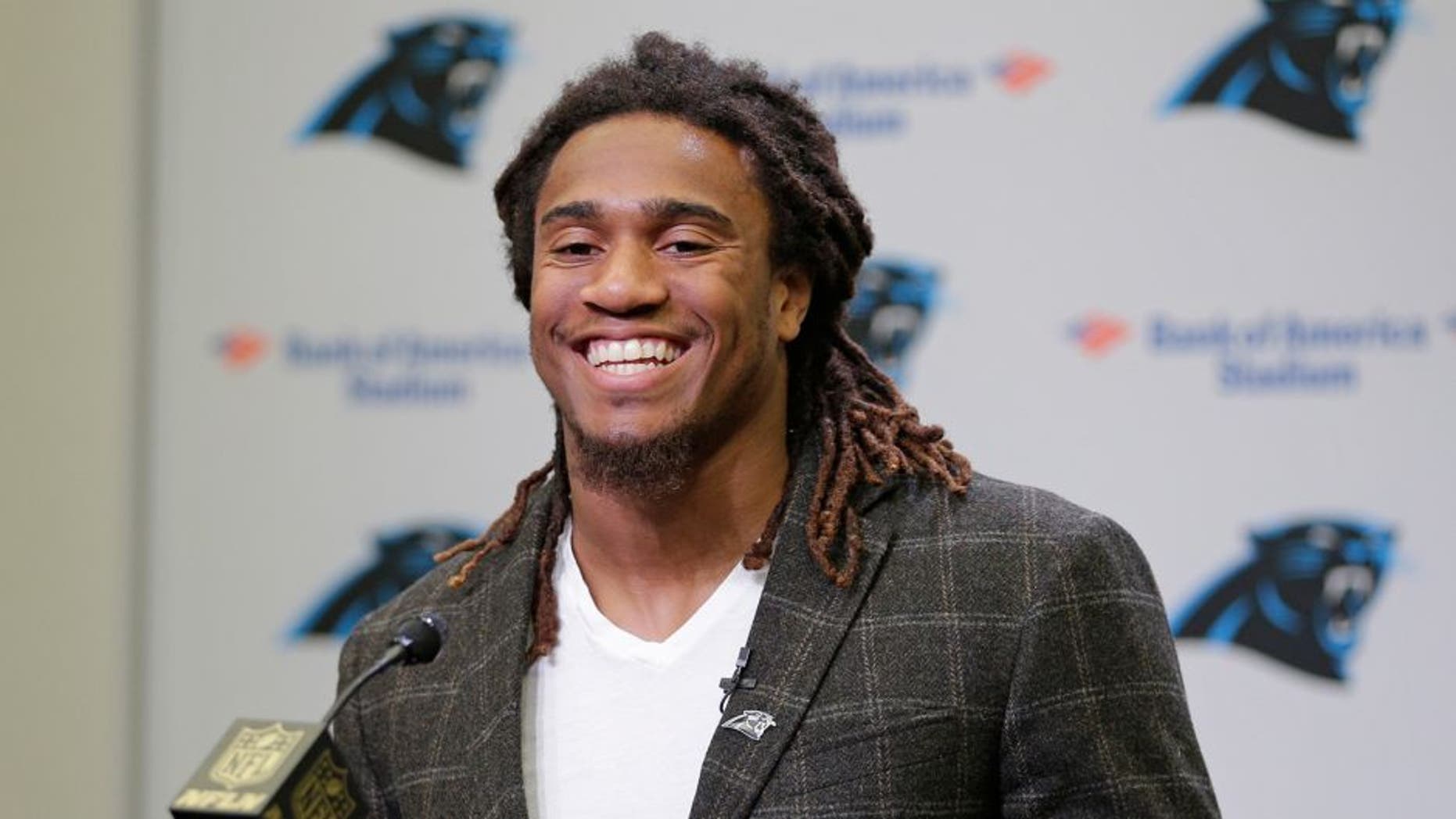 Carolina Panthers first round NFL draft choice Shaq Thompson smiles as he speaks to the media during a news conference in Charlotte, N.C., Friday, May 1, 2015. (AP Photo/Chuck Burton)