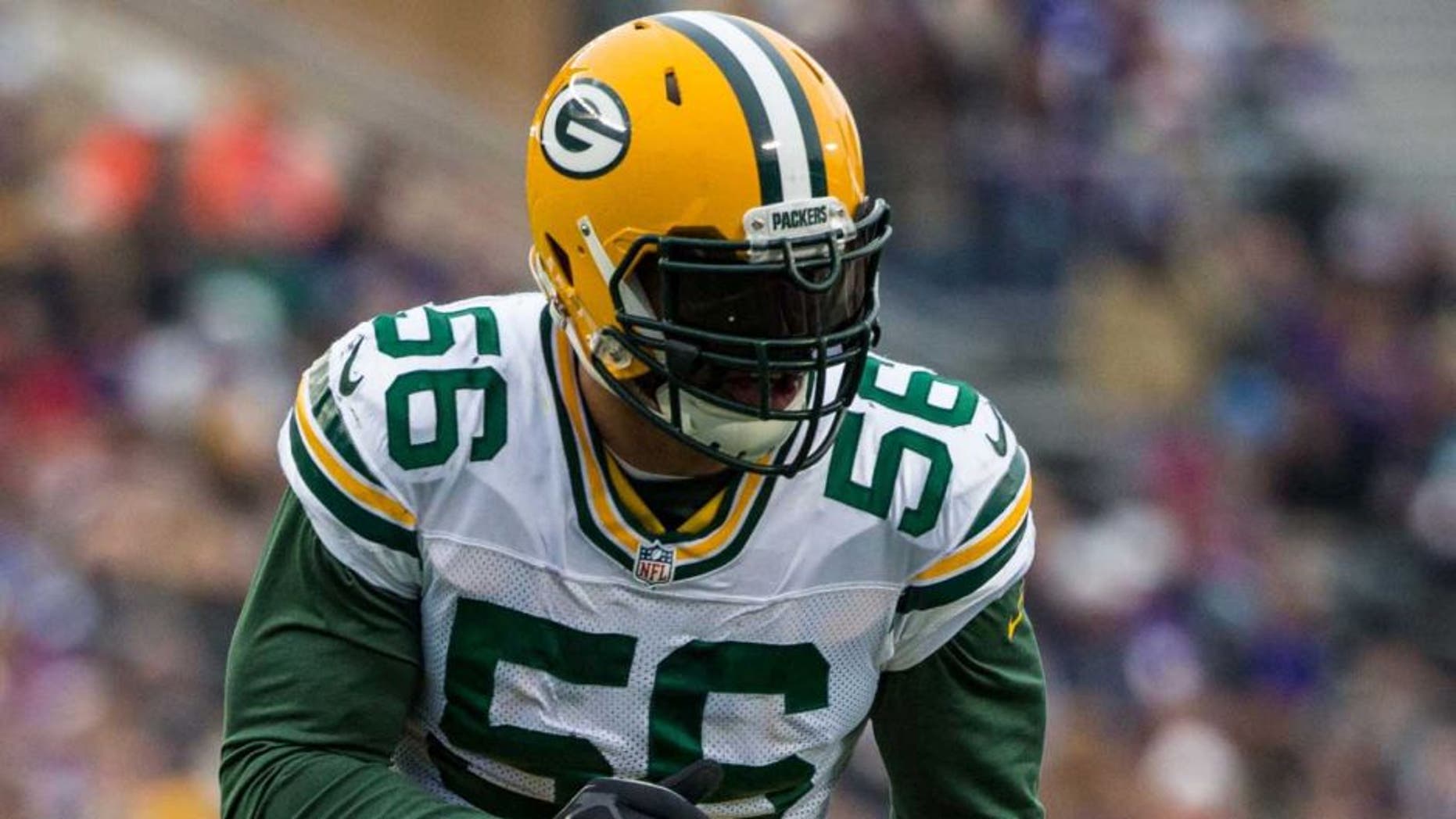 Nov 23, 2014; Minneapolis, MN, USA; Green Bay Packers linebacker Julius Peppers (56) runs during the second quarter against the Minnesota Vikings at TCF Bank Stadium. The Packers defeated the Vikings 24-21. Mandatory Credit: Brace Hemmelgarn-USA TODAY Sports