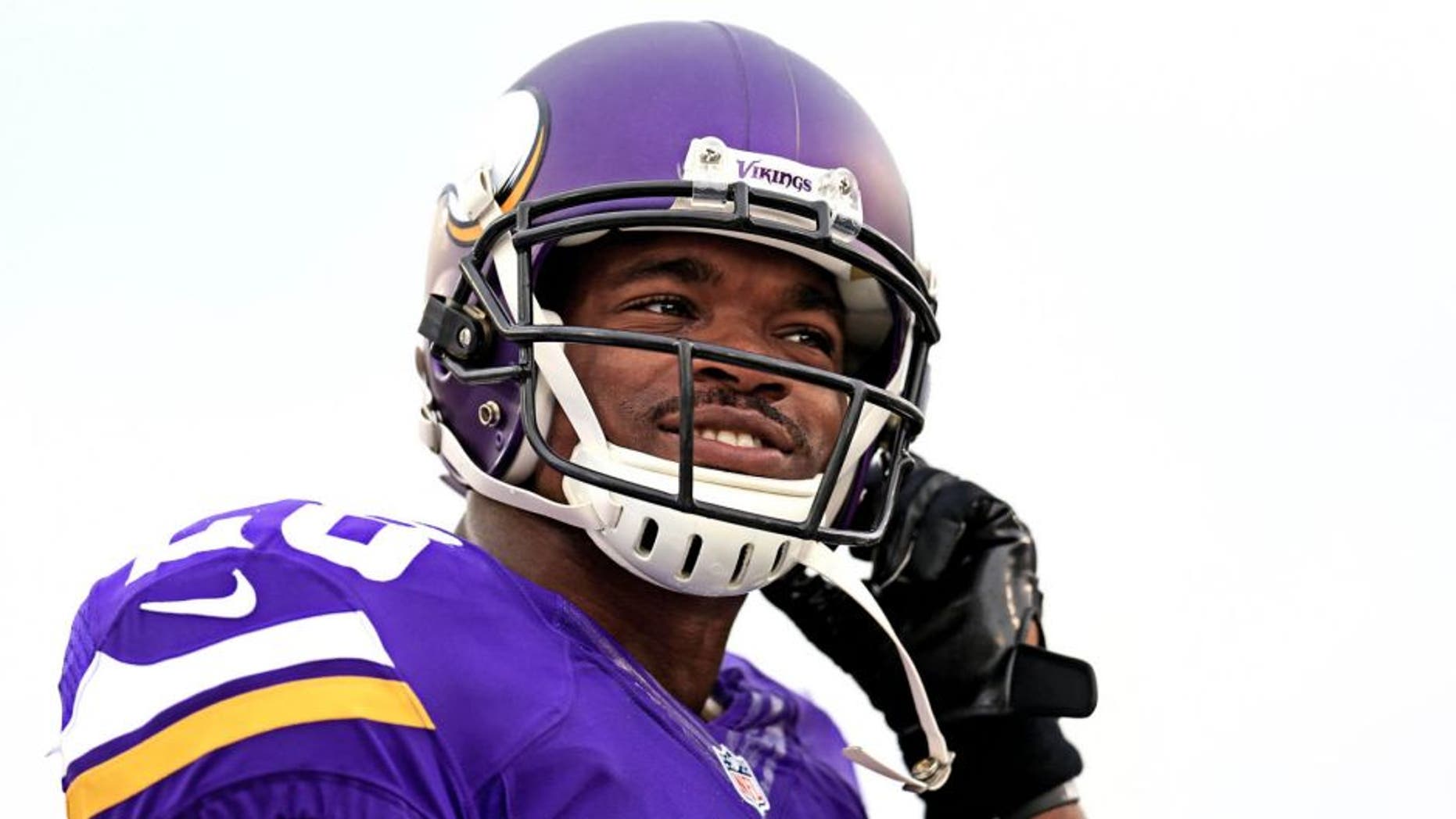 Minnesota Vikings running back Adrian Peterson looks on prior to the preseason game against the Pittsburgh Steelers at Tom Benson Hall of Fame Stadium on Aug. 9, 2015.
