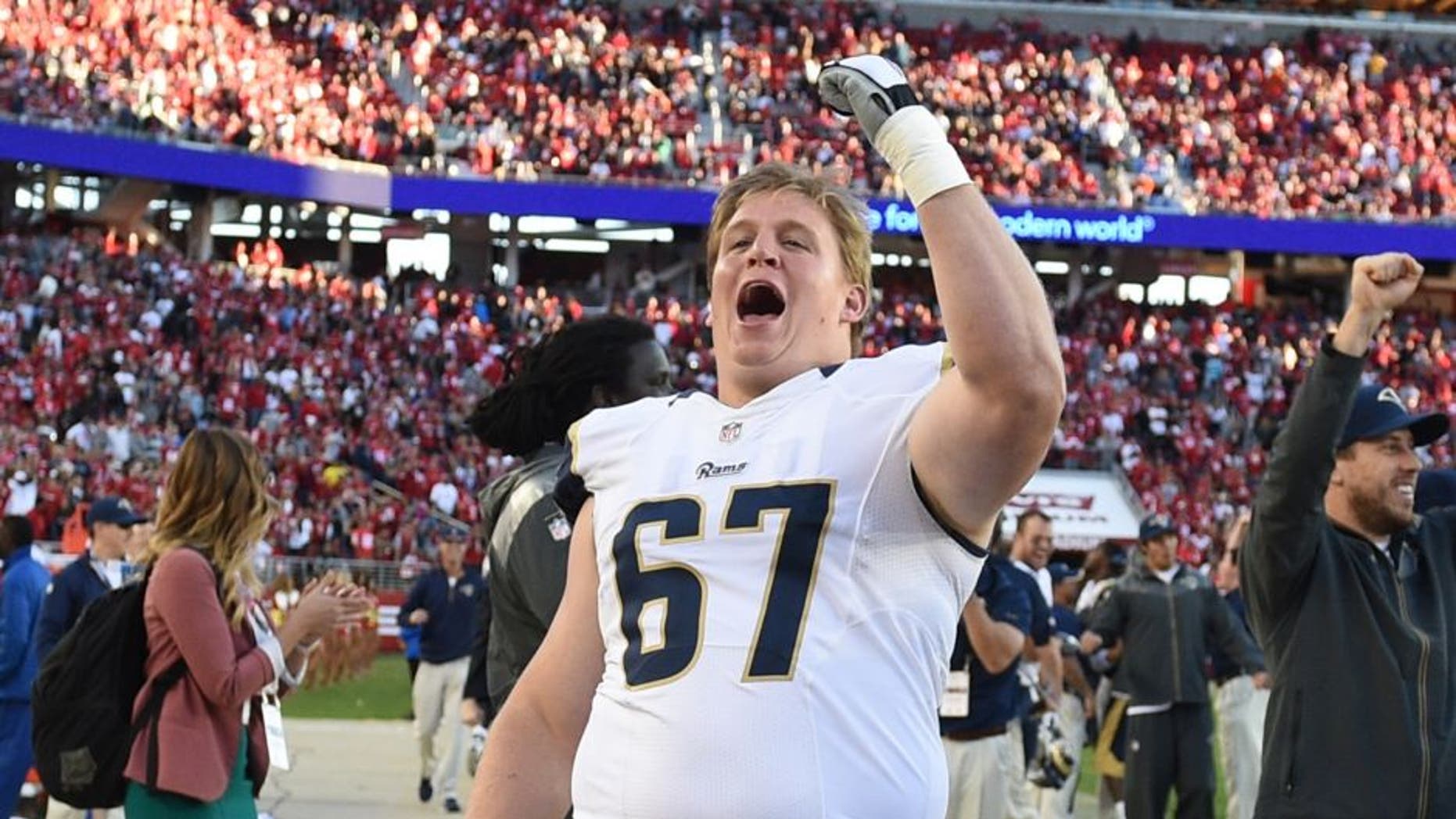 November 2, 2014; Santa Clara, CA, USA; St. Louis Rams guard Barrett Jones (67) celebrates during the fourth quarter against the San Francisco 49ers at Levi's Stadium. The Rams defeated the 49ers 13-10. Mandatory Credit: Kyle Terada-USA TODAY Sports