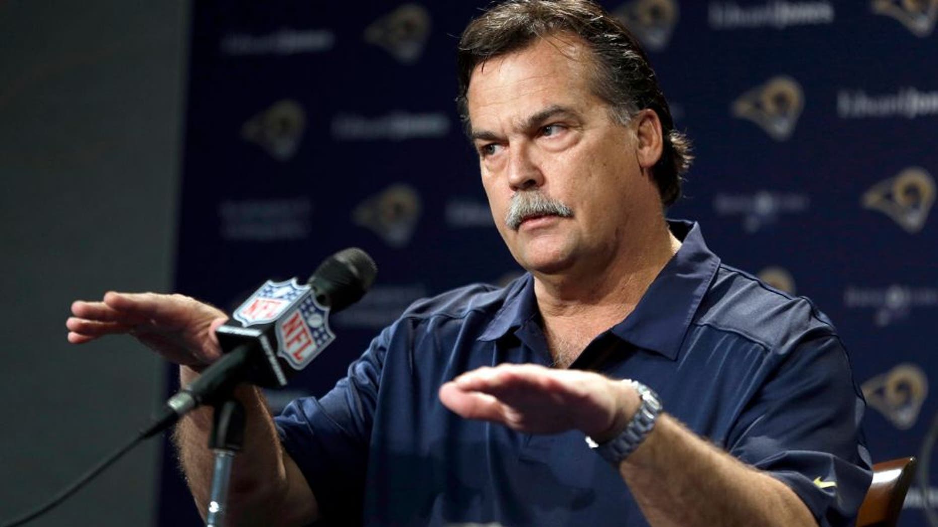 St. Louis Rams head coach Jeff Fisher speaks during a pre-draft news conference at the team's practice facility, Tuesday, May 6, 2014, in St. Louis. The Rams are scheduled to have two picks in the first-round of the NFL football draft on Thursday. (AP Photo/Jeff Roberson)
