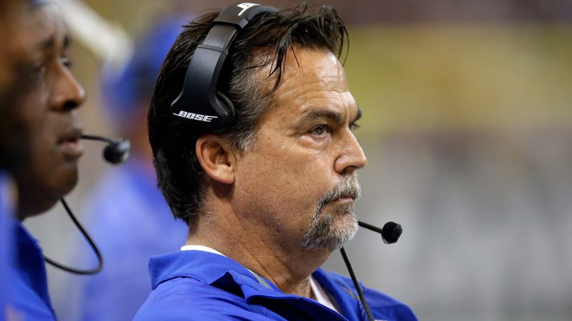 St. Louis Rams head coach Jeff Fisher watches from the sideline in the first quarter of an NFL football game against the San Francisco 49ers Monday, Oct. 13, 2014, in St Louis. (AP Photo/Scott Kane)