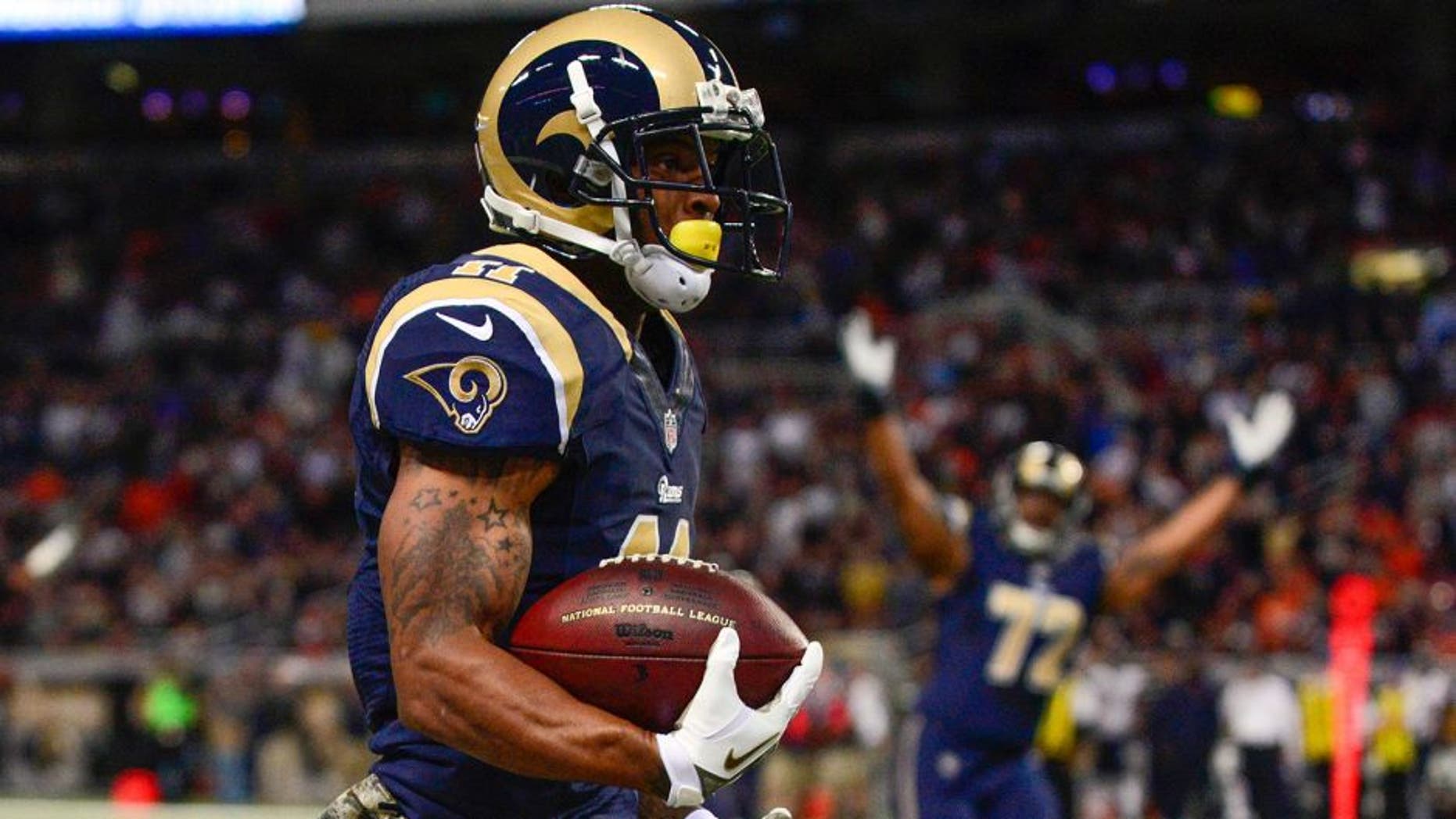 Nov 24, 2013; St. Louis, MO, USA; St. Louis Rams wide receiver Tavon Austin (11) carries the ball for a 65 yard touchdown during the first half against the Chicago Bears at the Edward Jones Dome. Mandatory Credit: Jeff Curry-USA TODAY Sports