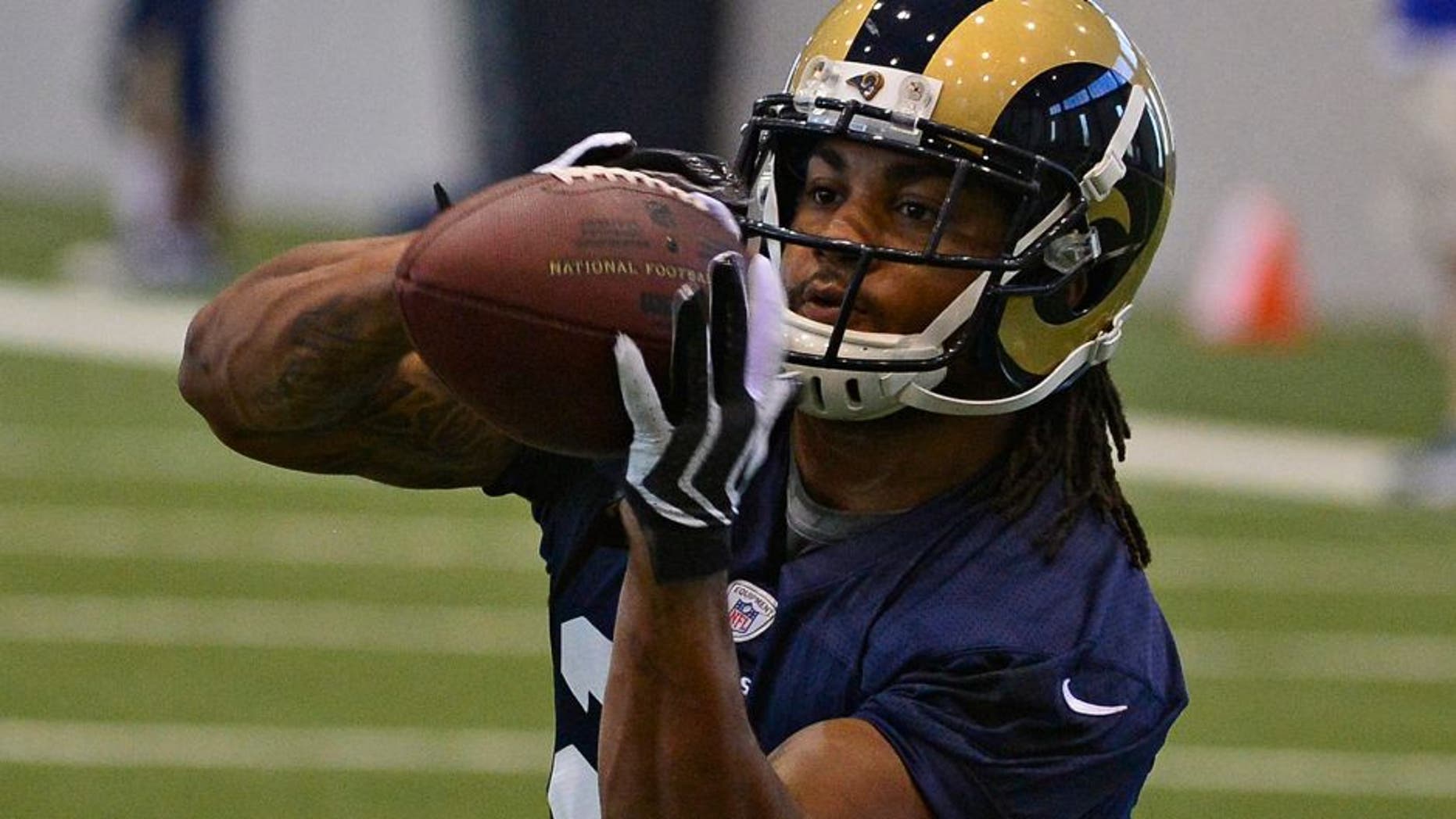 Jul 22, 2014; St. Louis, MO, USA; St. Louis Rams running back Tre Mason (27) runs through drills at Rams Park. Mandatory Credit: Jeff Curry-USA TODAY Sports