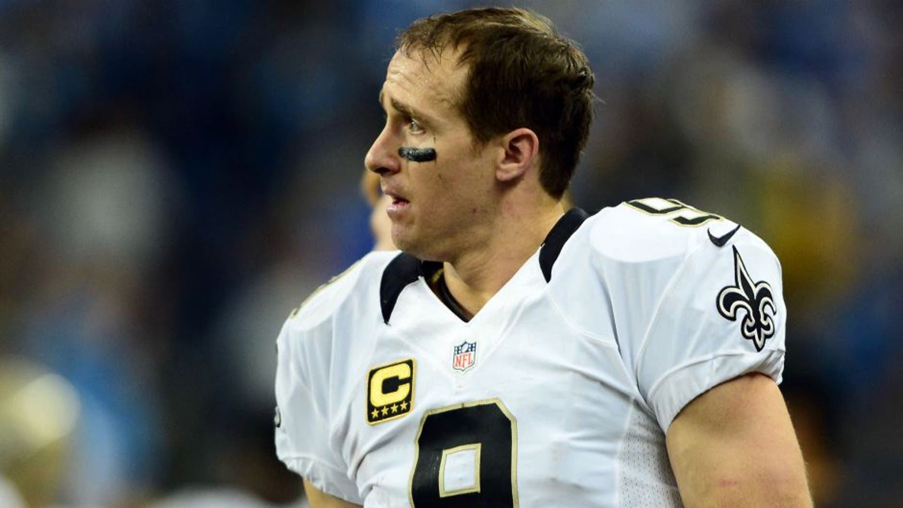 Oct 19, 2014; Detroit, MI, USA; New Orleans Saints quarterback Drew Brees (9) on the sidelines during the fourth quarter against the Detroit Lions at Ford Field. Lions defeated the Saints 24-23. Mandatory Credit: Andrew Weber-USA TODAY Sports