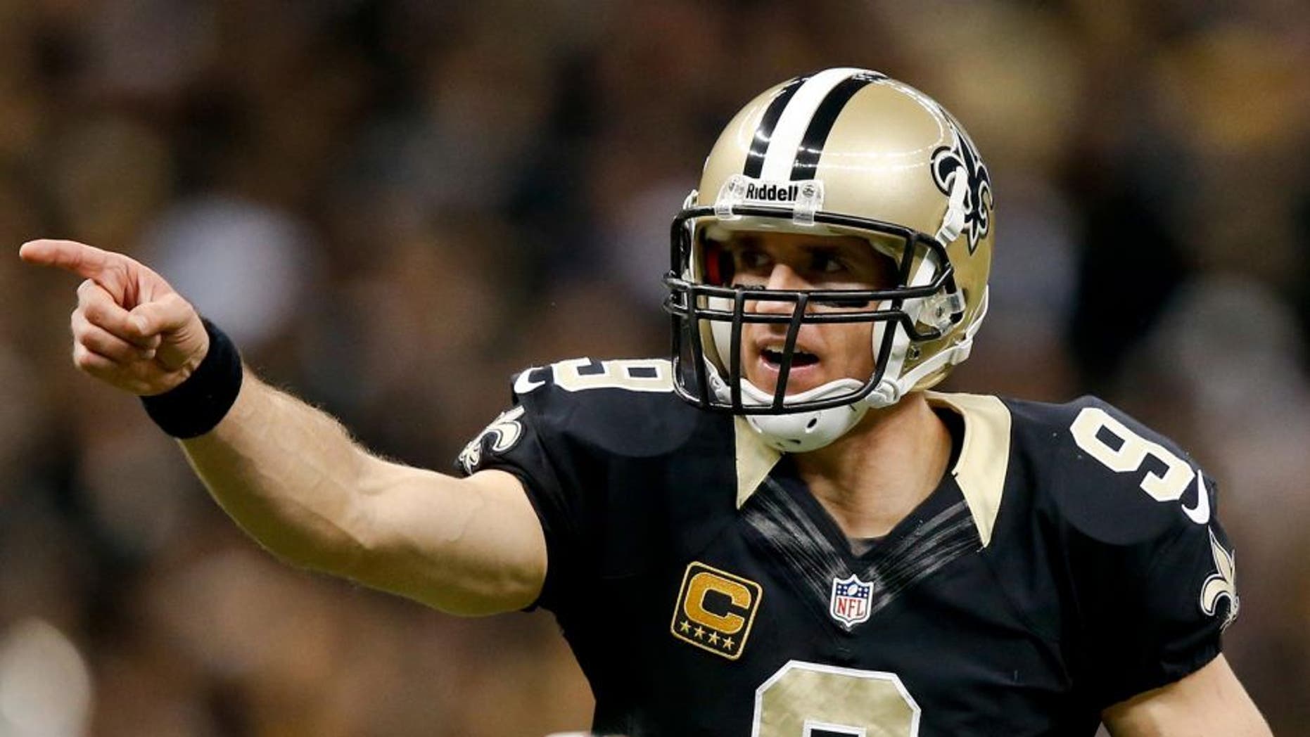 Dec 8, 2013; New Orleans, LA, USA; New Orleans Saints quarterback Drew Brees (9) against the Carolina Panthers during the second quarter of a game at Mercedes-Benz Superdome. Mandatory Credit: Derick E. Hingle-USA TODAY Sports
