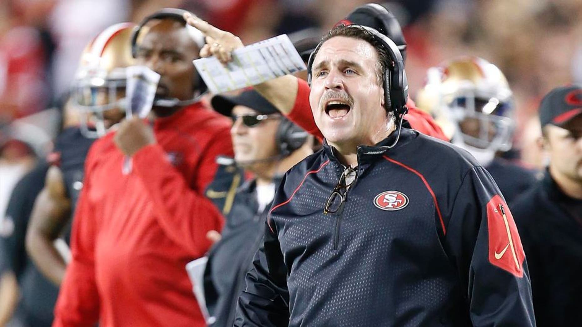 San Francisco 49ers head coach Jim Tomsula reacts on the sideline during the first half of an NFL football game against the Minnesota Vikings in Santa Clara, Calif., on Monday, Sept. 14, 2015.