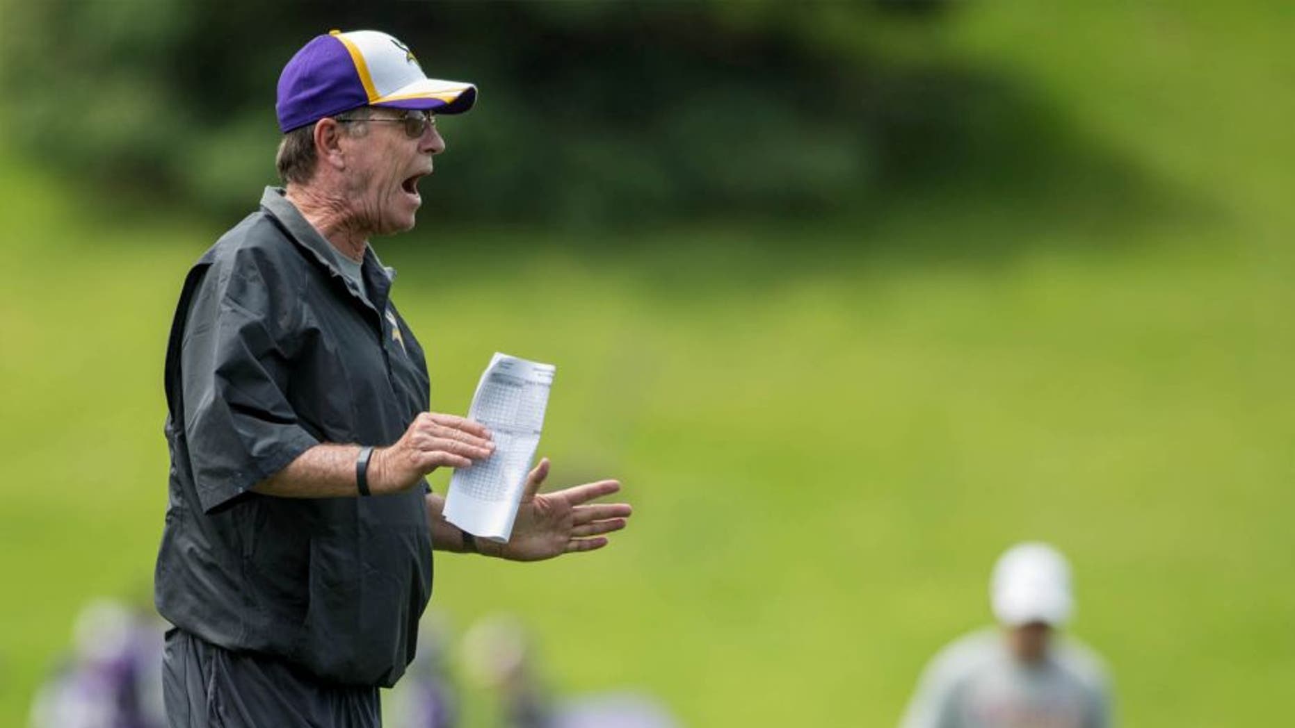 Jun 17, 2014; Eden Prairie, MN, USA; Minnesota Vikings offensive coordinator Norv Turner speaks to his team at practice at Winter Park.