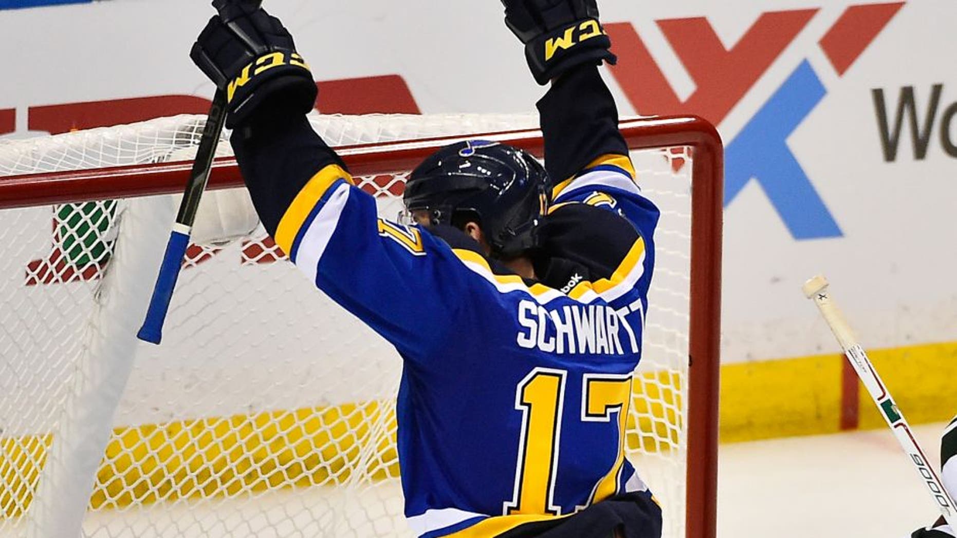 Apr 16, 2015; St. Louis, MO, USA; St. Louis Blues left wing Jaden Schwartz (17) celebrates after scoring a goal past Minnesota Wild goalie Devan Dubnyk (40) in the third period in game one of the first round of the the 2015 Stanley Cup Playoffs at Scottrade Center. The Minnesota Wild defeat the St. Louis Blues 4-2. Mandatory Credit: Jasen Vinlove-USA TODAY Sports