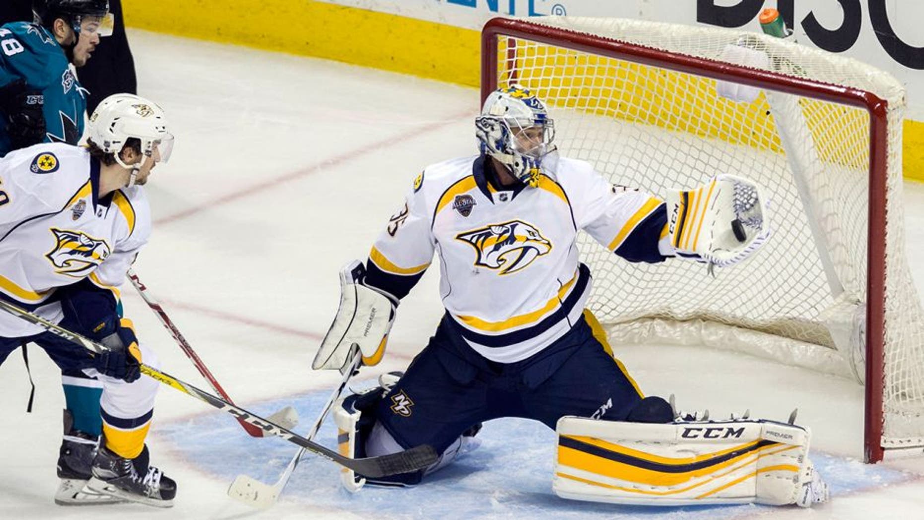 May 12, 2016; San Jose, CA, USA; Nashville Predators goalie Pekka Rinne (35) makes a save against San Jose Sharks center Tomas Hertl (48) in the second period in game seven of the second round of the 2016 Stanley Cup Playoffs at SAP Center at San Jose. Mandatory Credit: Neville E. Guard-USA TODAY Sports