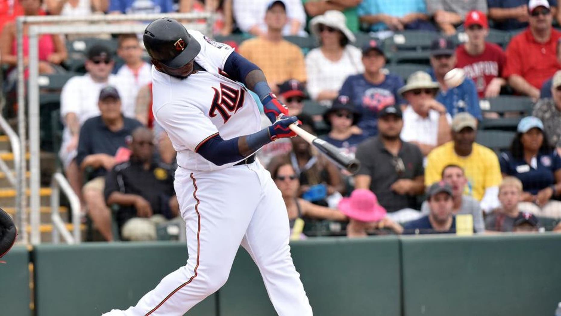 Mar 29, 2016; Fort Myers, FL, USA; Minnesota Twins right fielder Miguel Sano (22) connects for a solo home run during a spring training game against the Boston Red Sox at CenturyLink Sports Complex. Mandatory Credit: Steve Mitchell-USA TODAY Sports