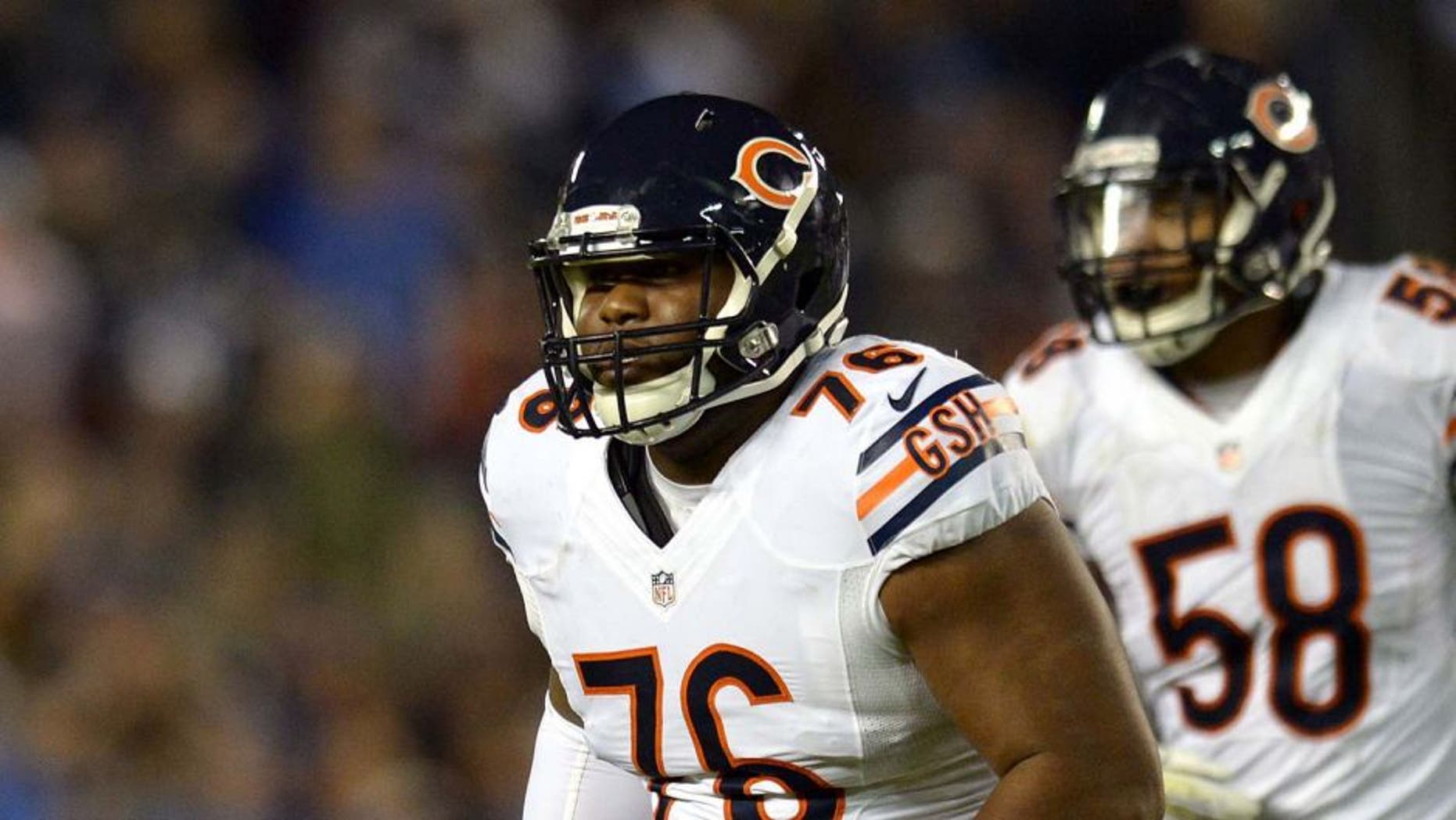Nov 9, 2015; San Diego, CA, USA; Chicago Bears nose tackle Bruce Gaston (76) and outside linebacker Jonathan Anderson (58) come off the field during the second quarter against the San Diego Chargers at Qualcomm Stadium. Mandatory Credit: Jake Roth-USA TODAY Sports