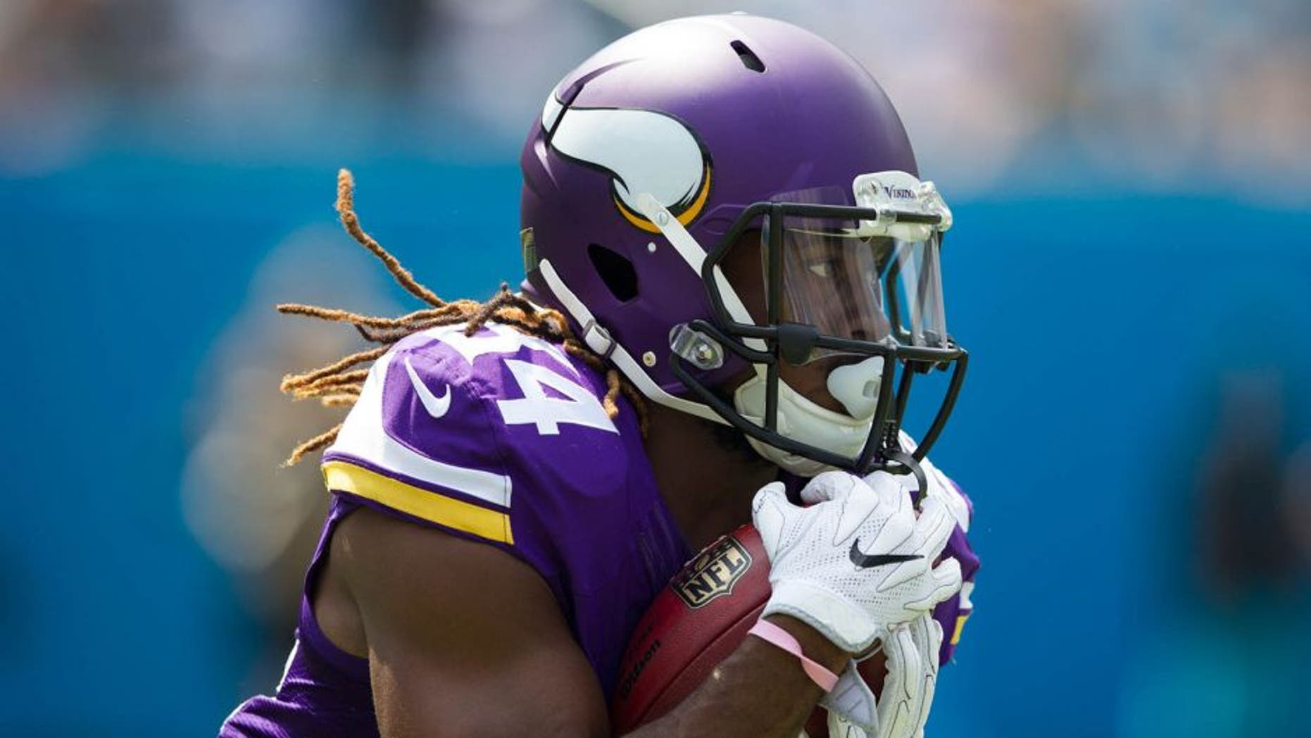 Sep 25, 2016; Charlotte, NC, USA; Minnesota Vikings wide receiver Cordarrelle Patterson (84) runs the ball during the first quarter against the Carolina Panthers at Bank of America Stadium. Mandatory Credit: Jeremy Brevard-USA TODAY Sports