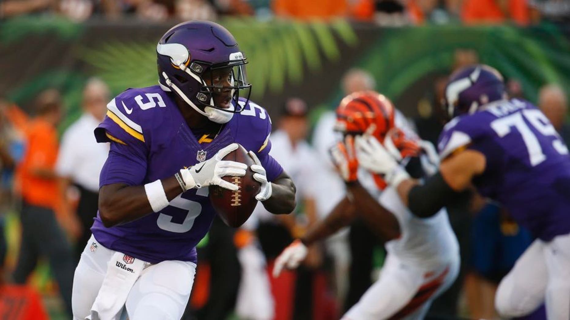 Minnesota Vikings quarterback Teddy Bridgewater looks to throw during the first half of a preseason NFL football game against the Cincinnati Bengals.
