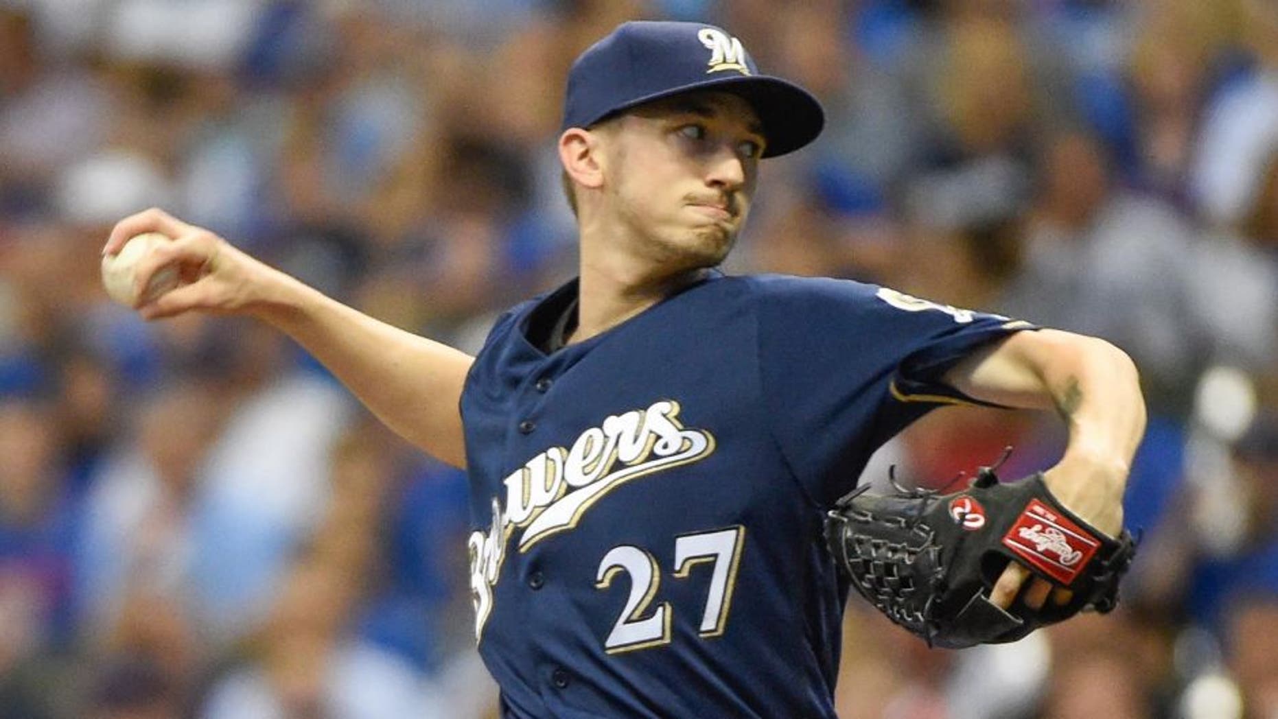 Milwaukee Brewers starting pitcher Zach Davies throws during the first inning of a baseball game against the Chicago Cubs, Saturday, July 23, 2016, in Milwaukee. (AP Photo/Benny Sieu)