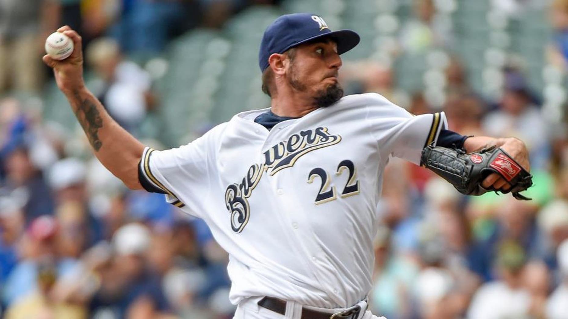 Aug 11, 2016; Milwaukee, WI, USA; Milwaukee Brewers pitcher Matt Garza throws a pitch in the first inning against the Atlanta Braves at Miller Park. Mandatory Credit: Benny Sieu-USA TODAY Sports