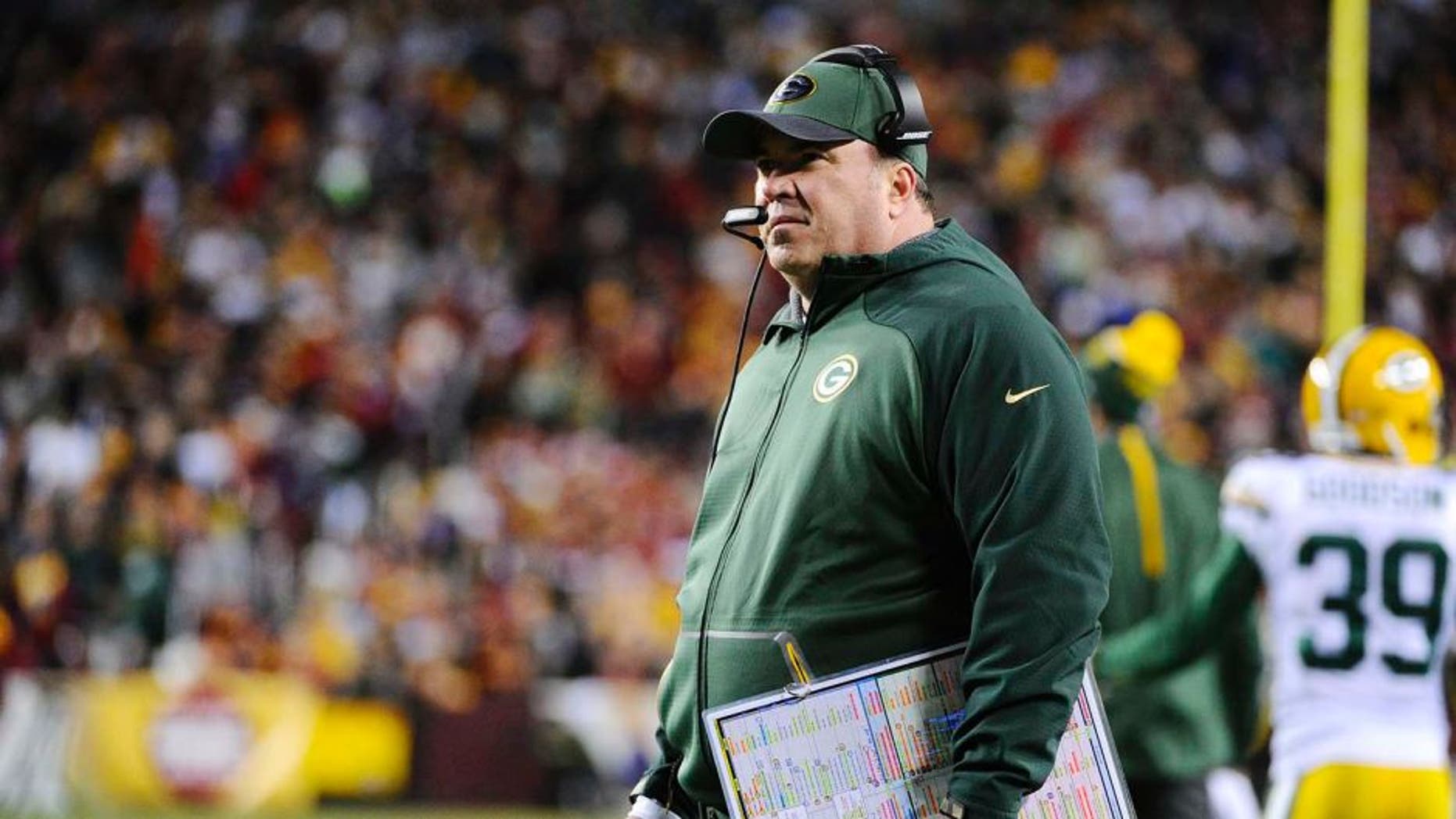 Jan 10, 2016; Landover, MD, USA; Green Bay Packers head coach Mike McCarthy looks on from the sidelines against the Washington Redskins during the second half in a NFC Wild Card playoff football game at FedEx Field. Mandatory Credit: Brad Mills-USA TODAY Sports