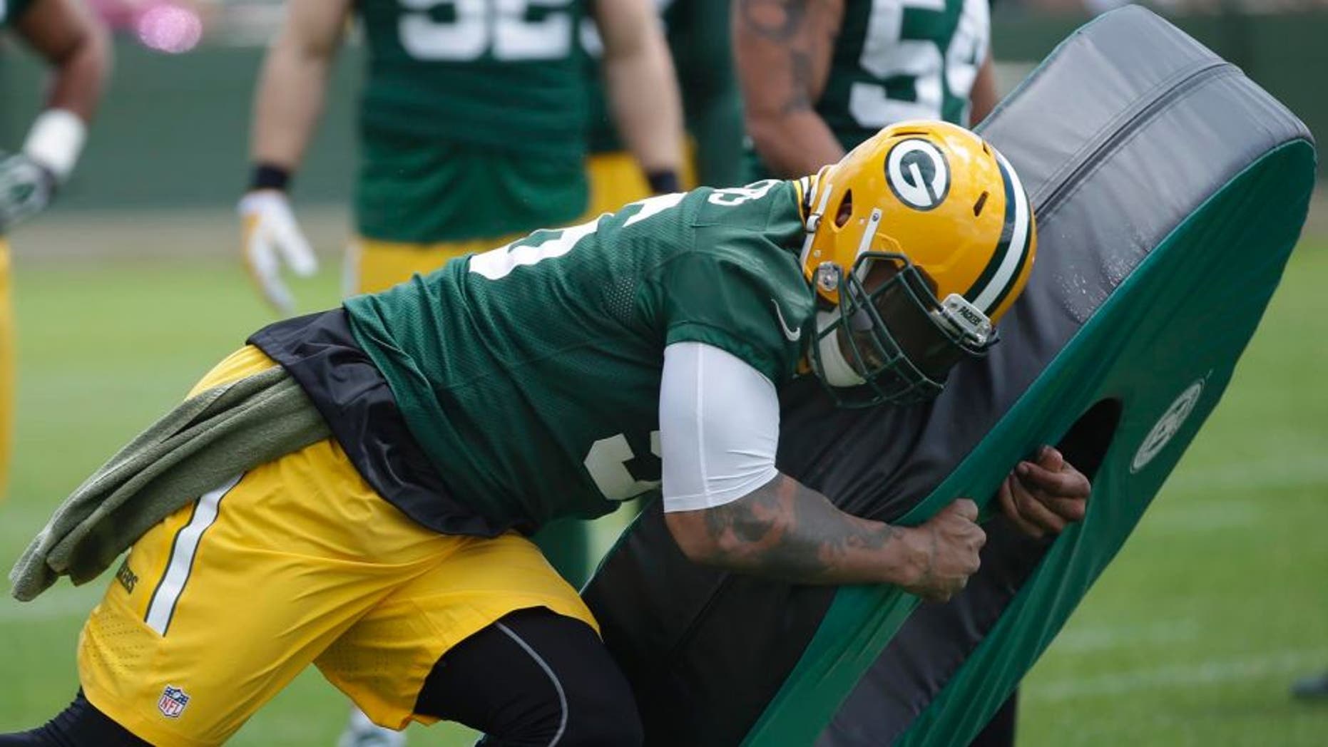 June 2, 2016; Green Bay, WI, USA; Green Bay Packers outside linebacker Julius Peppers (56) during organized team activities. Mandatory Credit: Mark Hoffman/Milwaukee Journal Sentinel via USA TODAY NETWORK