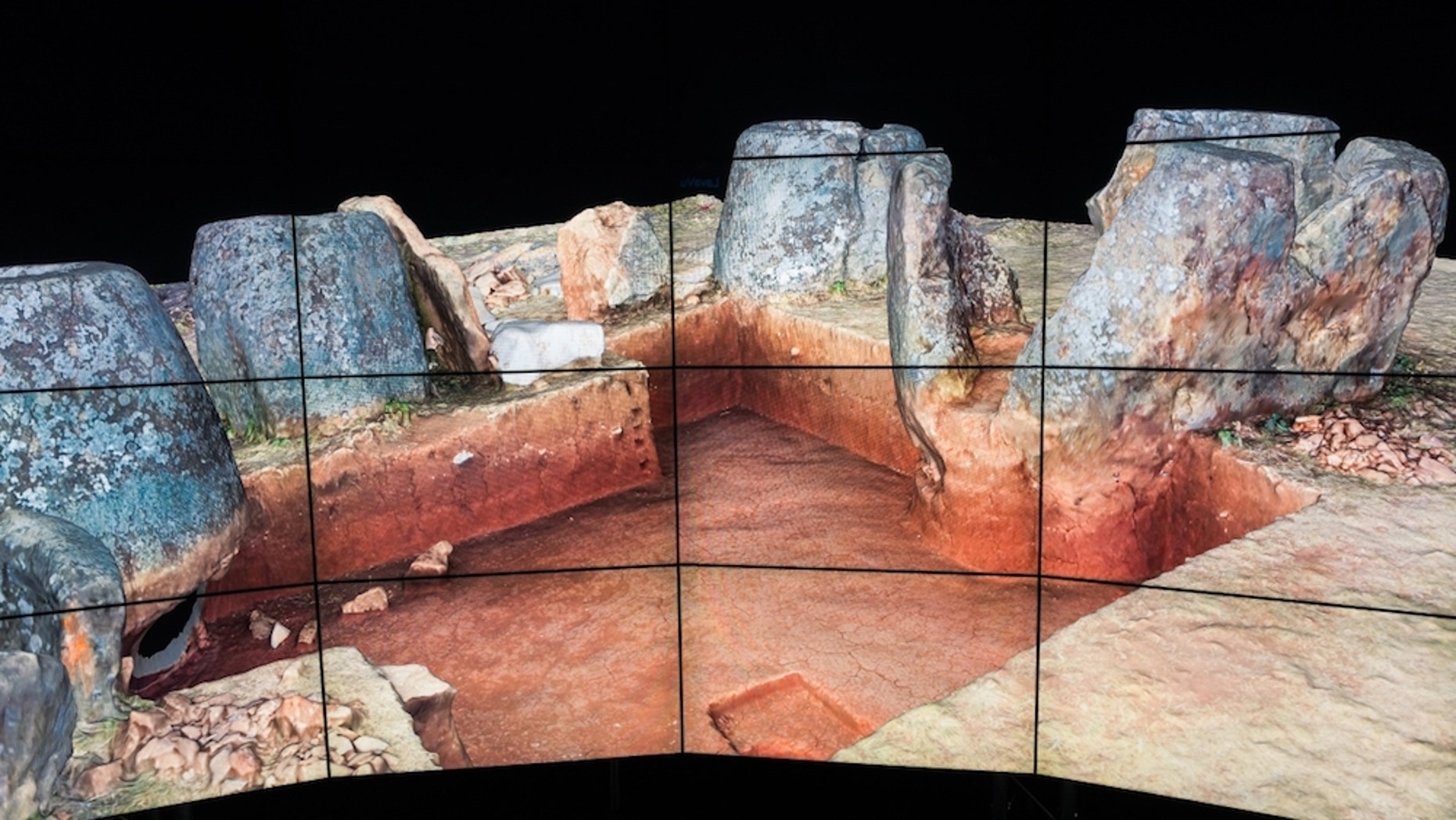 The aerial landscape images and other data from research at the Plain of Jars have been integrated into an advanced 3D simulation at the Cave2 virtual reality facility at Monash University.