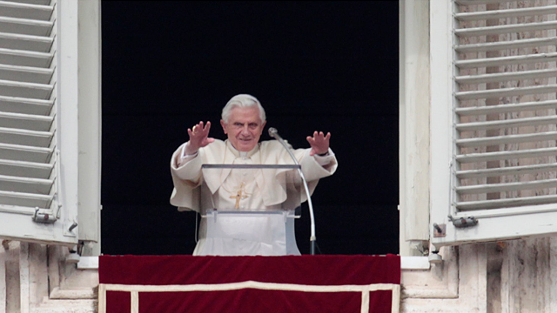 Feb. 20, 2011: Pope Benedict XVI greets the faithful from his studio's window overlooking St. Peter's square during the Angelus prayer at the Vatican