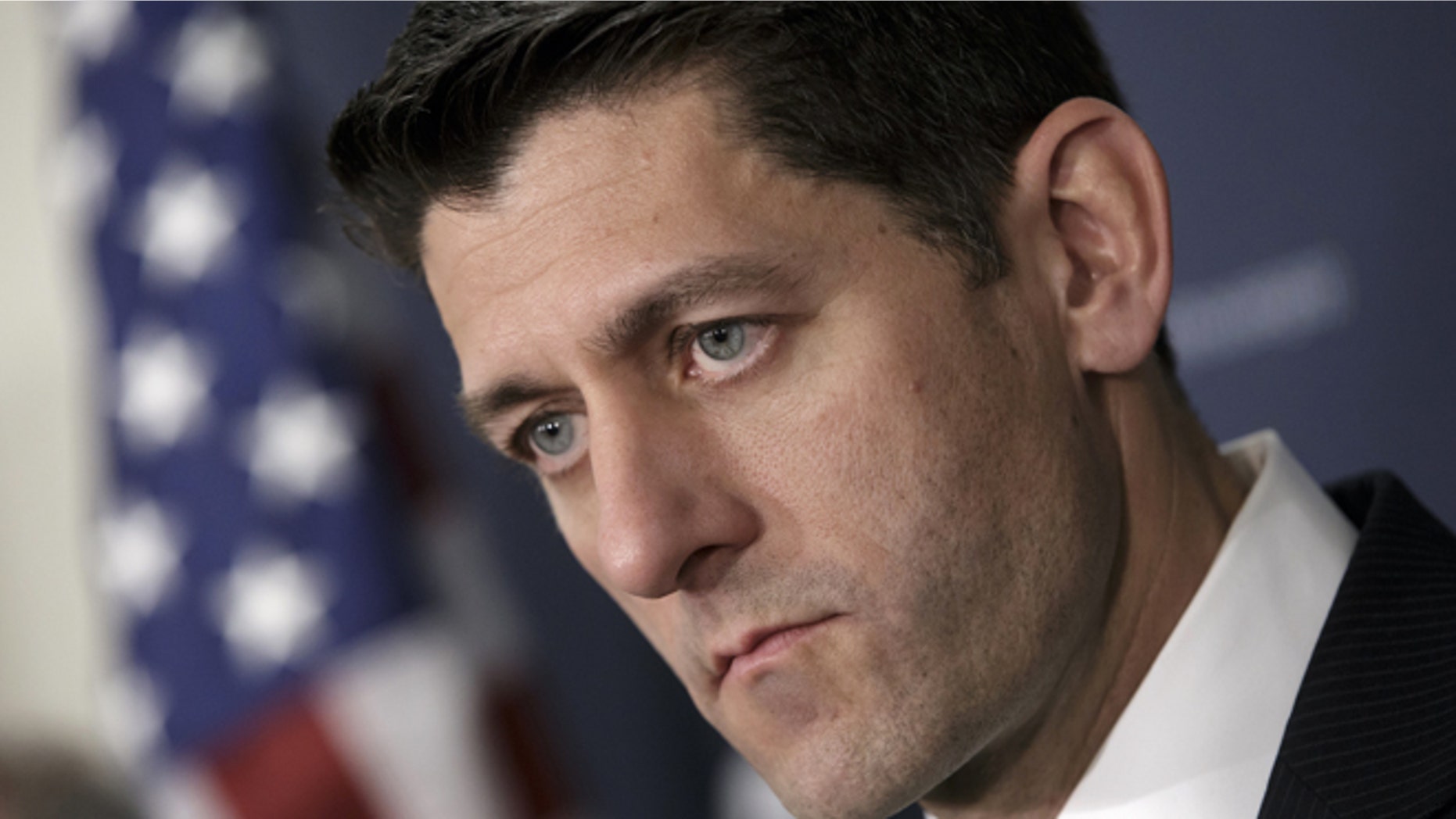 In this April 13, 2016, file photo House Speaker Paul Ryan of Wis., pauses during a news conference on Capitol Hill in Washington. Debt-ridden Puerto Rico faces a $422 million bond payment deadline May 1 with no sign Congress will act in time to help. Further complicating lawmakers efforts to steer the U.S. territory away from economic collapse are ads airing nationwide that claim the legislation amounts to a financial bailout even though the bill has no direct financial aid. House conservatives have latched onto that argument, making it difficult for Ryan, to garner support for the bill. (AP Photo/J. Scott Applewhite, File)