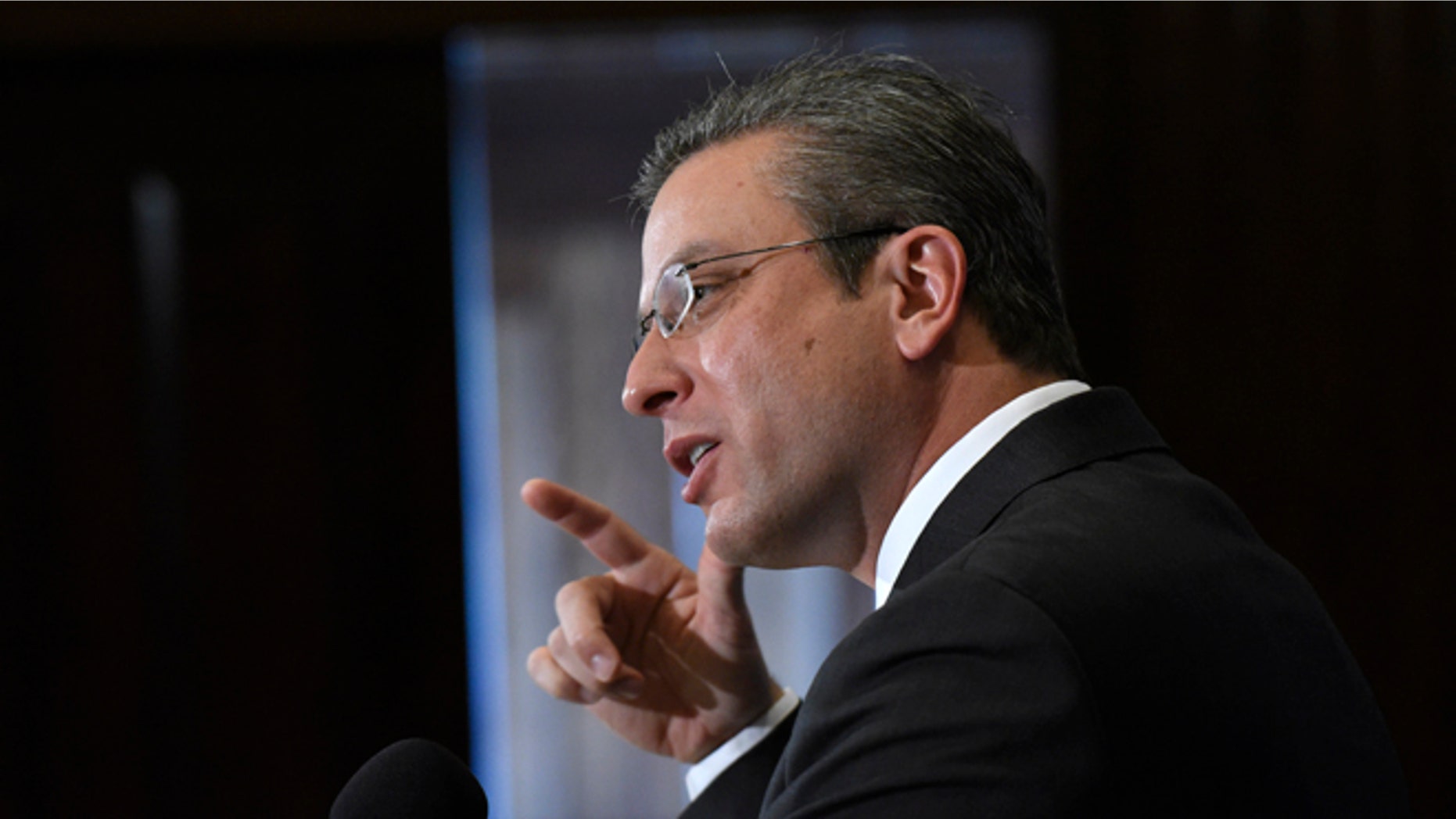 FILE - In this Dec. 16, 2015, file photo, Puerto Rico Gov. Alejandro Javier Garcia Padilla speaks at a luncheon at the National Press Club in Washington. Puerto Rico's governor unveiled a stark budget Monday, May 23, 2016, that sets aside more than $200 million for a critical bond payment as the U.S. territory sinks into a deep economic crisis. (AP Photo/Sait Serkan Gurbuz,File)