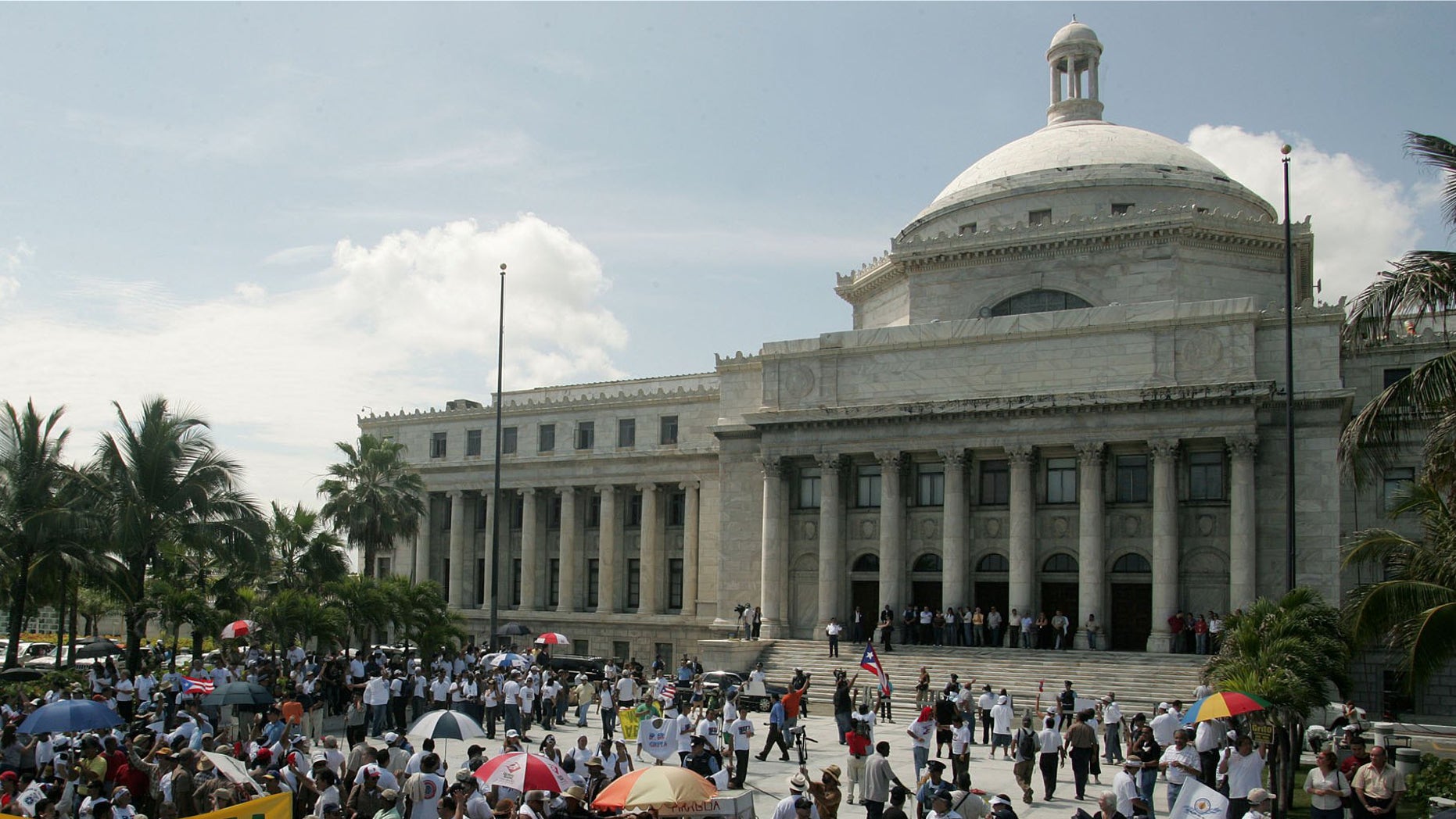 SAN JUAN, PUERTO RICO - APRIL 28: (PUERTO RICO OUT) Tens of thousands march towards the Capitol building April 28, 2006 in San Juan, Puerto Rico, demanding the legislature to approve a line of credit that would avoid the goverment from shutting down May 1, 2006 affecting over 200,000 public employees. The demonstration was called "Puerto Rico Grita" or "Scream Puerto Rico". (Photo by Jose Jimenez-Tirado/Getty Images)