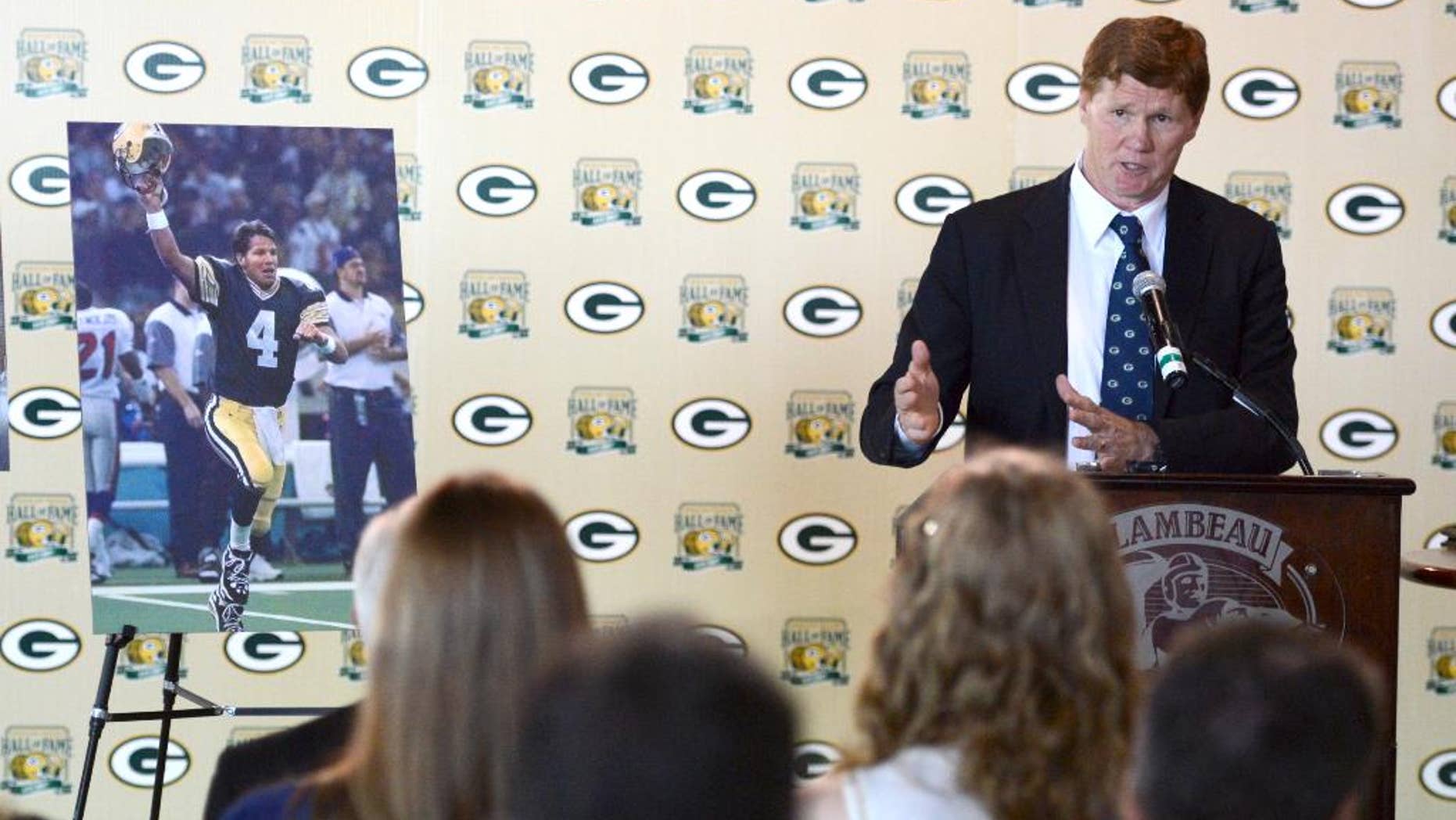 Green Bay Packers president/CEO Mark Murphy announces during a news conference at Lambeau Field, Monday, August 4, 2014, that former Packers quarterback Brett Favre's name and No. 4 will be unveiled inside Lambeau Field during a game in the fall of 2015. (AP Photo/The Green Bay Press-Gazette, H. Marc Larason) NO SALES
