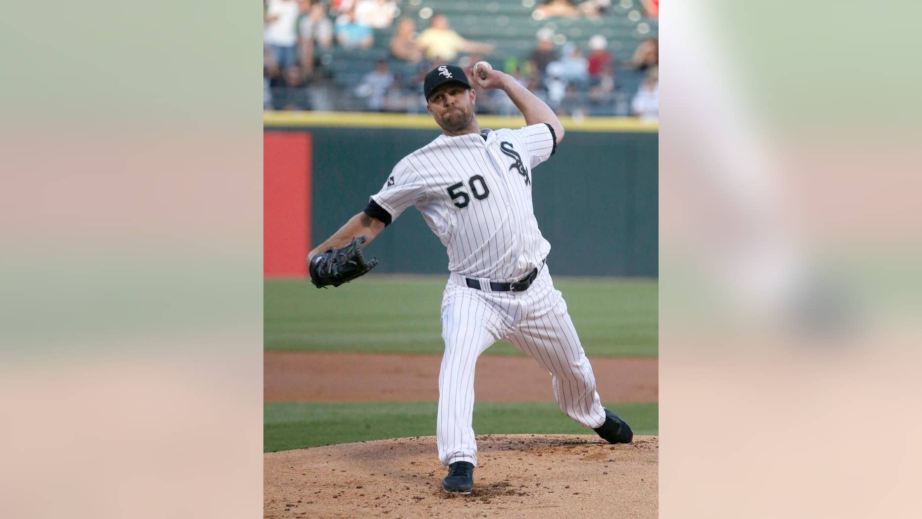Chicago White Sox starting pitcher John Danks delivers during the first inning of an interleague baseball game against the San Diego Padres on Friday, May 30, 2014, in Chicago. (AP Photo/Charles Rex Arbogast)