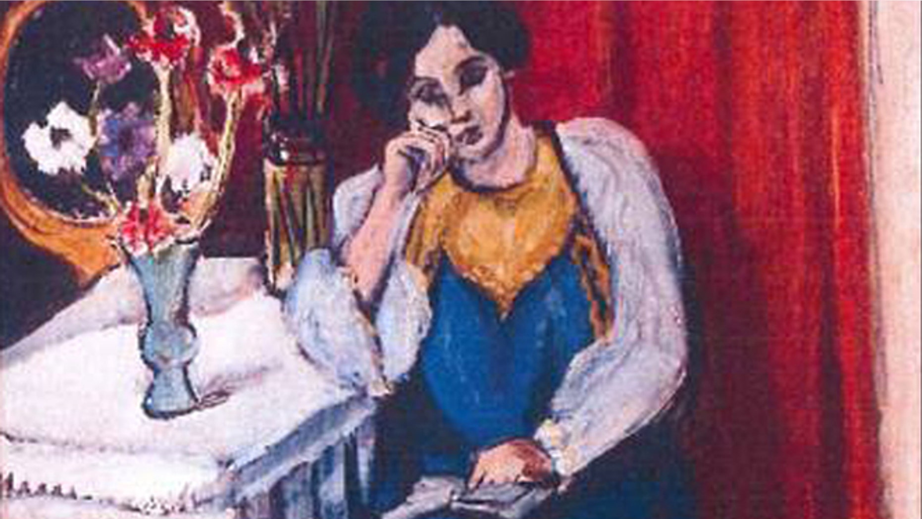 This is an unfated photo released by the police in Rotterdam, Netherlands, on Tuesday, Oct. 16, 2012, shows the 1919 painting 'Reading Girl in White and Yellow' by Henri Matisse.