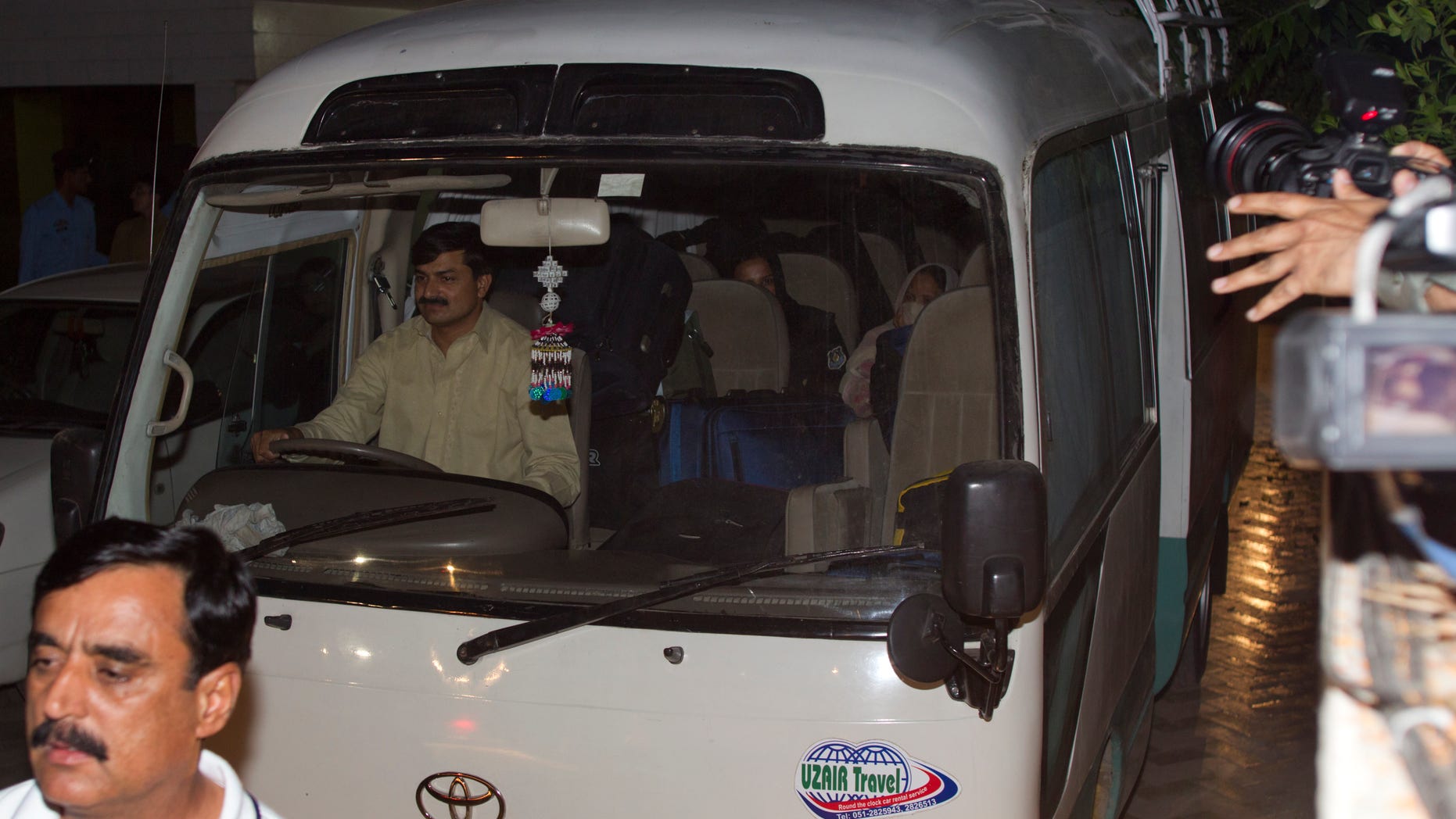 April 26, 2012: A minivan carries the family of Usama bin Laden, in Islamabad, Pakistan.