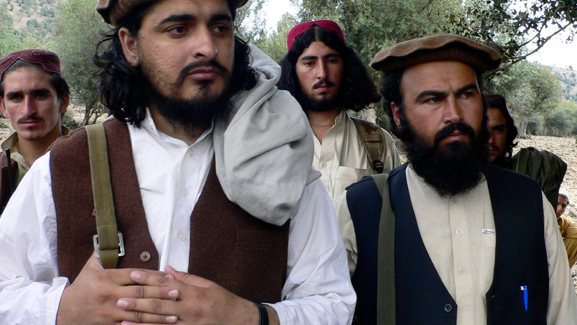 Oct. 4, 2009 - FILE photo of Pakistani Taliban chief Hakimullah Mehsud, left, with comrade Waliur Rehman during a meeting with media in Sararogha, a Pakistani tribal area of South Waziristan.