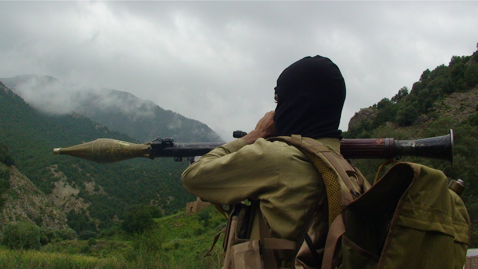 In a photo made Aug. 5, 2012, a Pakistani Taliban militant holds a rocket-propelled grenade at the Taliban stronghold of Shawal, in Pakistani tribal region of Waziristan along the Afghanistan border. Pakistan's decision to launch an operation against Islamist militants holed up in a key tribal sanctuary along the Afghan border has sparked rare optimism among U.S. officials who have been demanding action for years. (AP Photo/ Ishtiaq Mahsud)