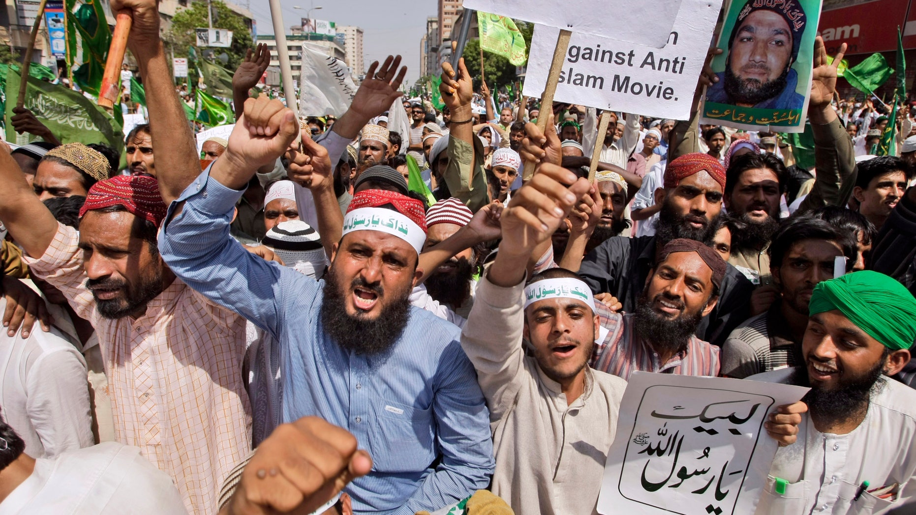 Sept. 29, 2012 - Pakistanis shout slogans during a rally to protest against a film insulting the Prophet Muhammad, in Karachi, Pakistan.