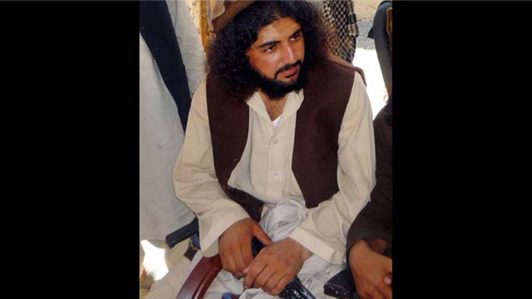 Oct. 4, 2009: In this file photo, Pakistani Taliban commander Latif Mehsud sits with fellows in Sararogha in south Waziristan in Pakistan. (AP)