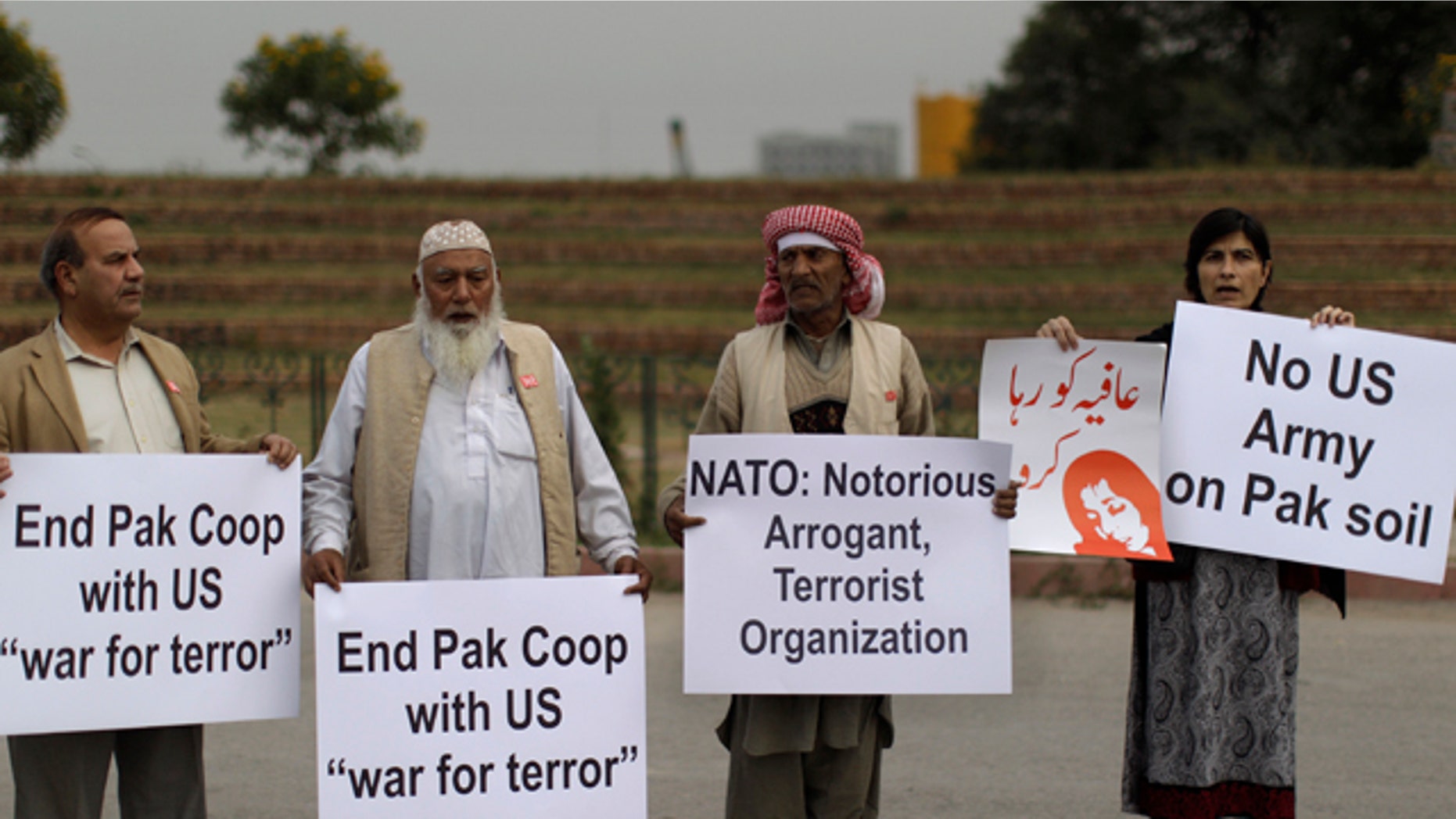 Dec. 1: Pakistanis hold placards and chant slogans during a protest to condemn NATO helicopters attacks on Pakistani troops, in Islamabad, Pakistan.