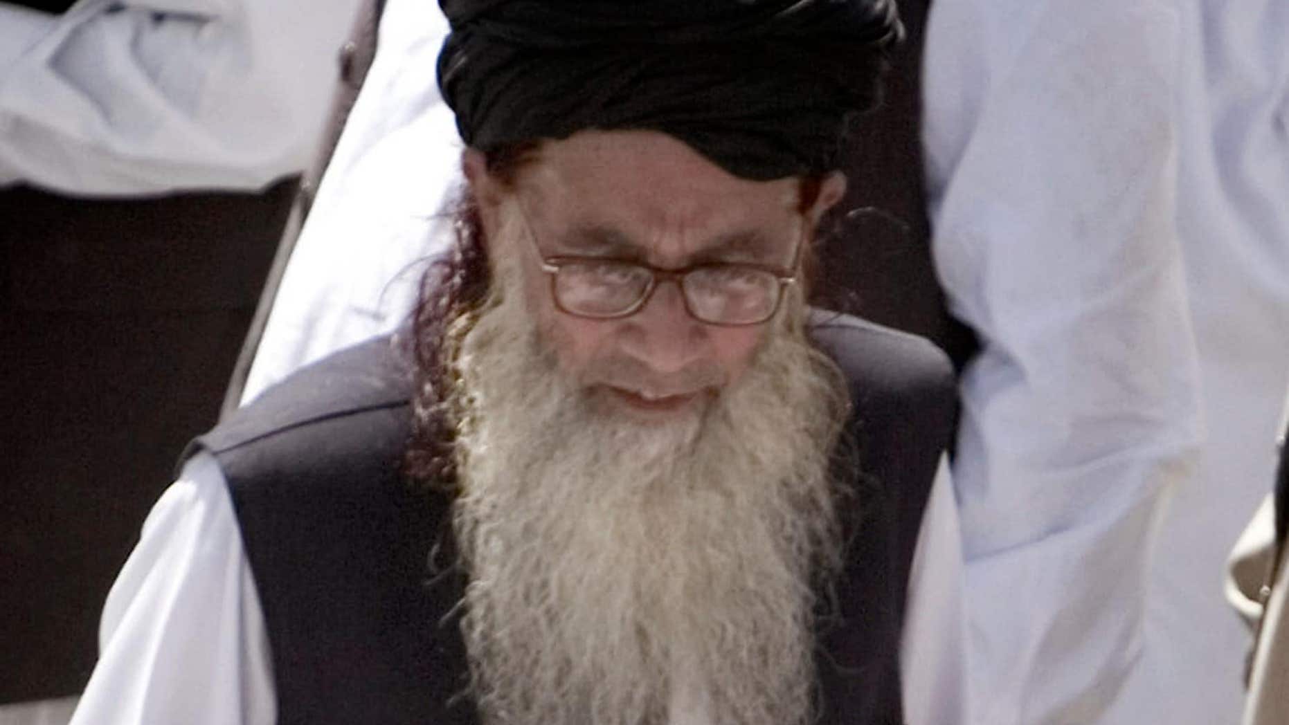 FILE 2009: Pakistan’s hard line cleric Sufi Muhammad arrives to address his supporters in Mingora, Pakistan.