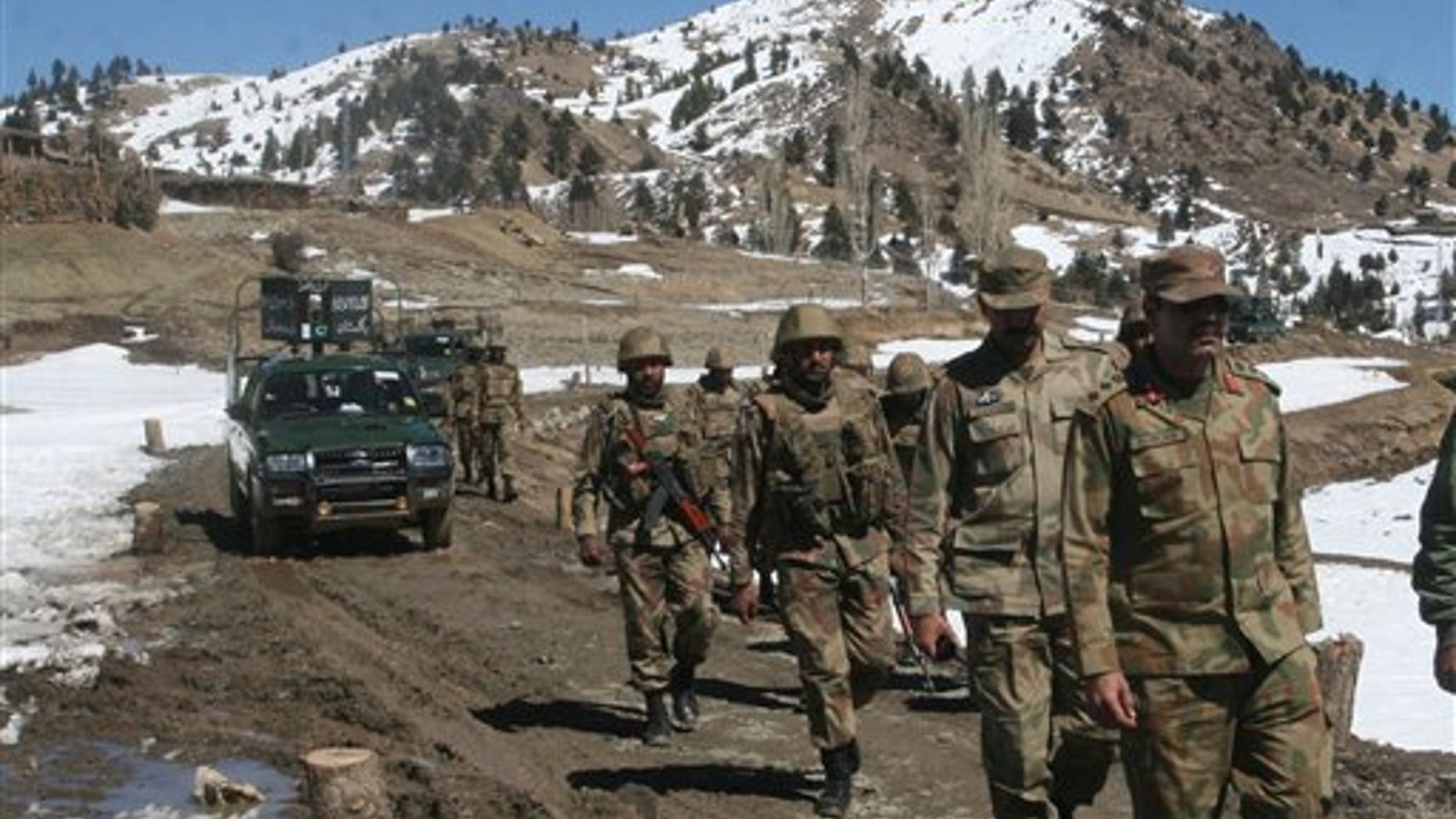 March 2011: Pakistan army soldiers patrol in the Pakistani tribal area of Ditta Kheil in North Waziristan where the Pakistan army are fighting against militants and al-Qaida activists along the Afghanistan border.