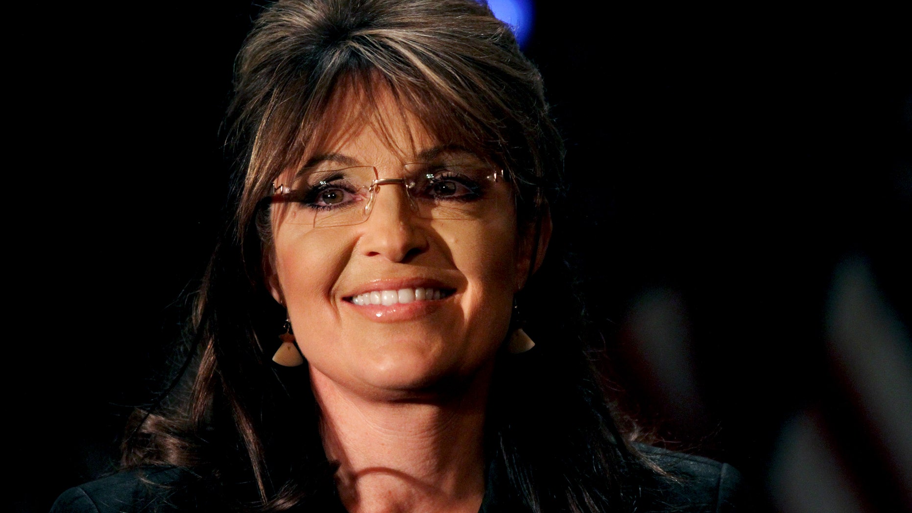 Feb. 17: Former Alaska Gov. Sarah Palin smiles as she is introduced during a public appearance at a Long Island Association (LIA) meeting and luncheon in Woodbury, N.Y. Palin says she is still thinking about running for president in 2012, but has not made up her mind.