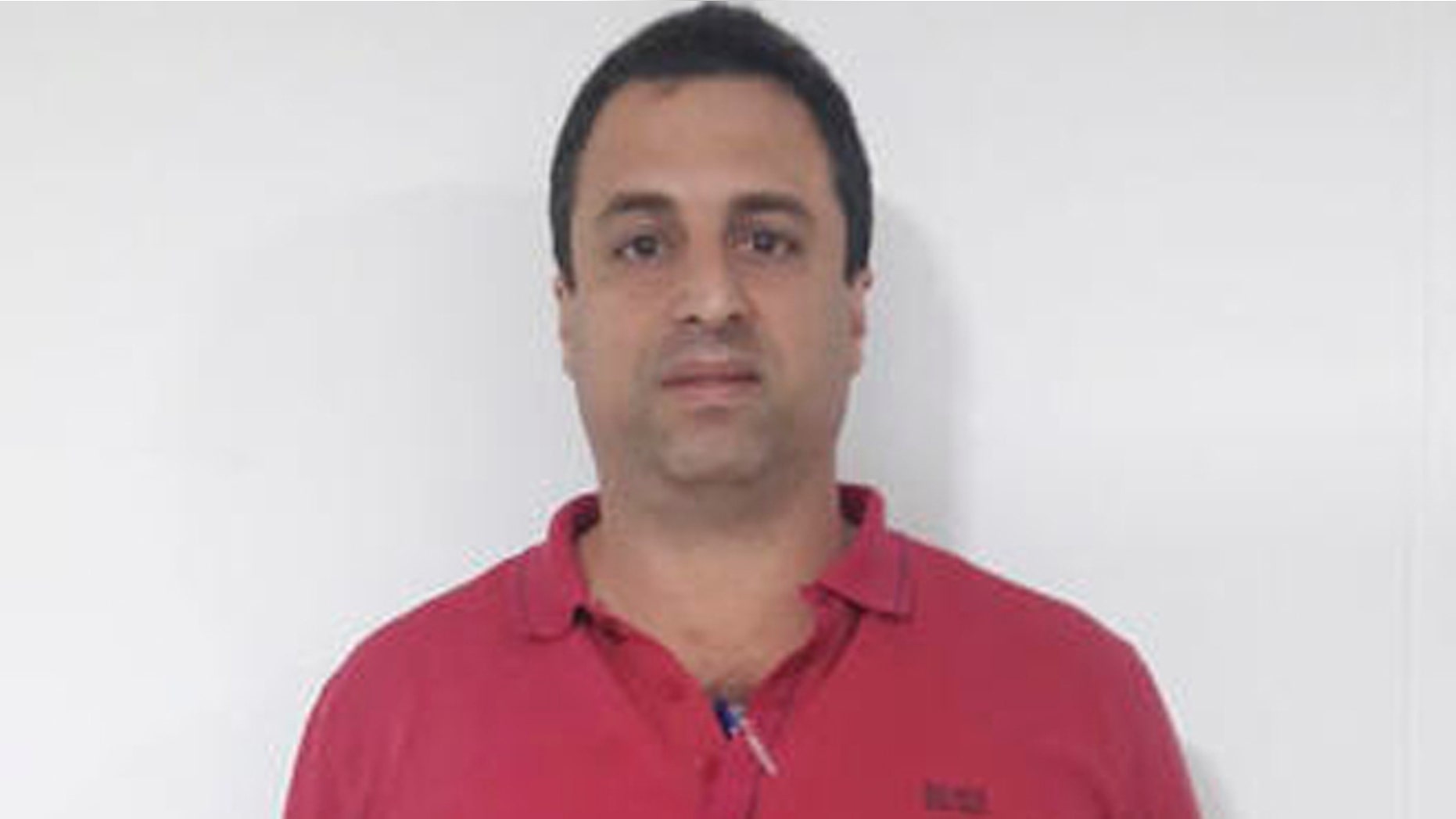 This photo released by Colombias National Police shows Panama businessman Nidal Waked after he was arrested at the international airport in Bogota, Colombia, Wednesday, May 4, 2016. Waked is sought by the United States, accused of being a leader of an organization that laundered drug profits through a web of companies including a luxury mall, a bank and the duty-free zone at Panama City's international airport. (AP Photo/Colombia's National Police)