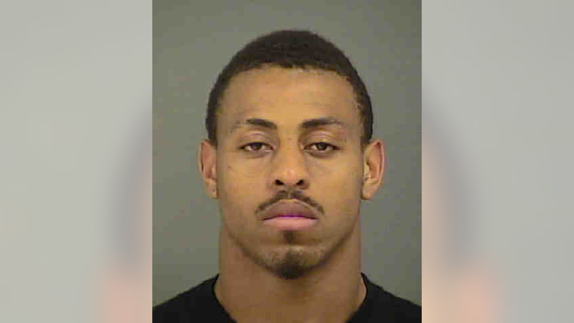 This photo provided by the Mecklenburg County Sheriff's Department shows Carolina Panthers defensive end Greg Hardy after his arrest in Charlotte, N.C., Tuesday, May 13, 2014. Hardy was arrested for assault on a female and communicating threats, according to Charlotte Mecklenburg police. Hardy turned himself into Mecklenburg County police on Tuesday morning. (AP Photo/Mecklenburg County Sheriff's Office)