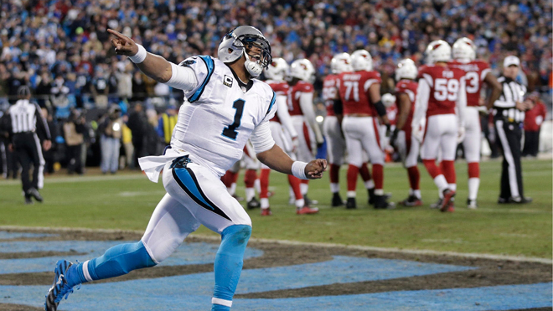 FILe - In this jan. 24, 2016, file photo, Carolina Panthers' Cam Newton celebrates his touchdown run during the first half the NFL football NFC Championship game against the Arizona Cardinals, n Charlotte, N.C. The Super Bowl bound Carolina Panthers have outscored their two playoff opponents 55-7 in the first half of games. (AP Photo/Chuck Burton, File)